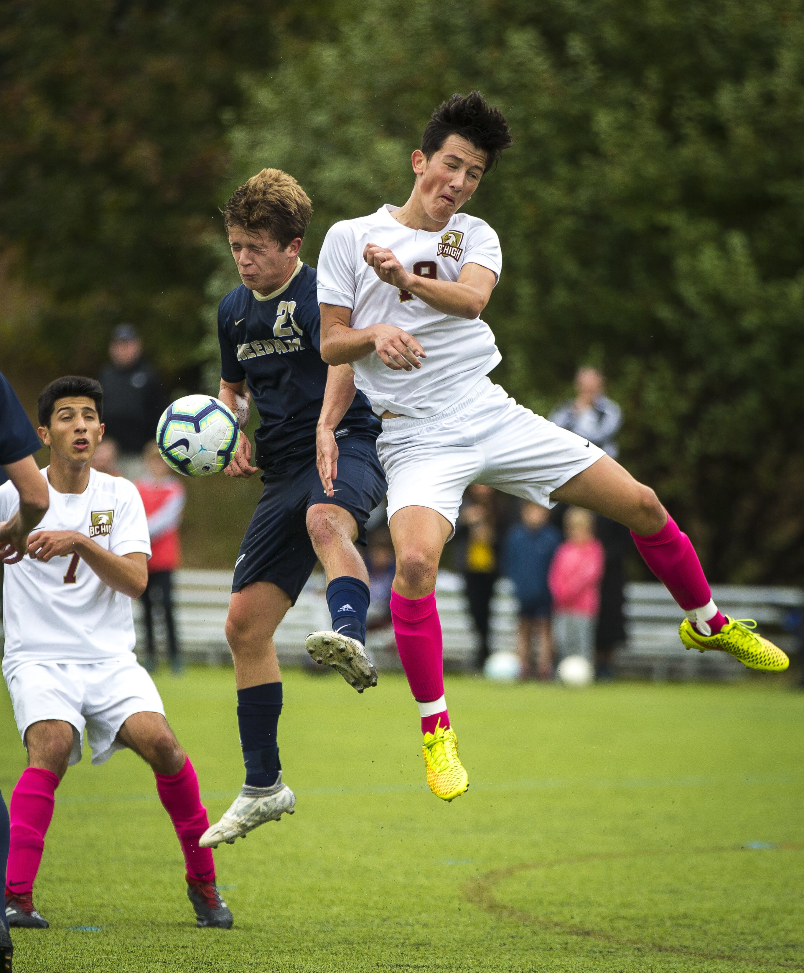 Needham’s Steven Donovan (left) and BC High’s Anatolily Berezyuk fight for possession during a recent game at DeFazio Field in Needham.