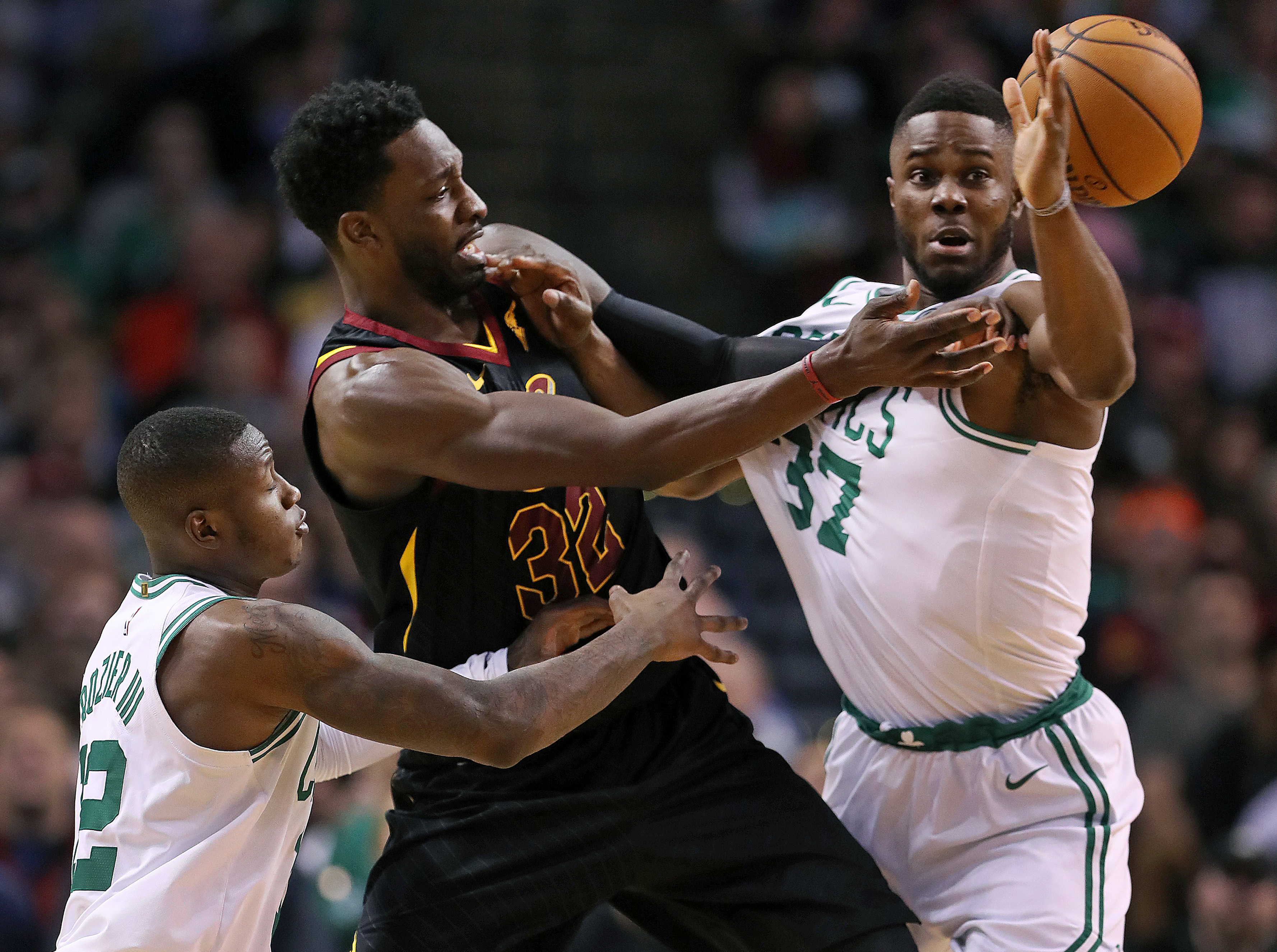 Celtics Terry Rozier (left) and Semi Ojeleye (right) double team Jeff Green in the fourth quarter.