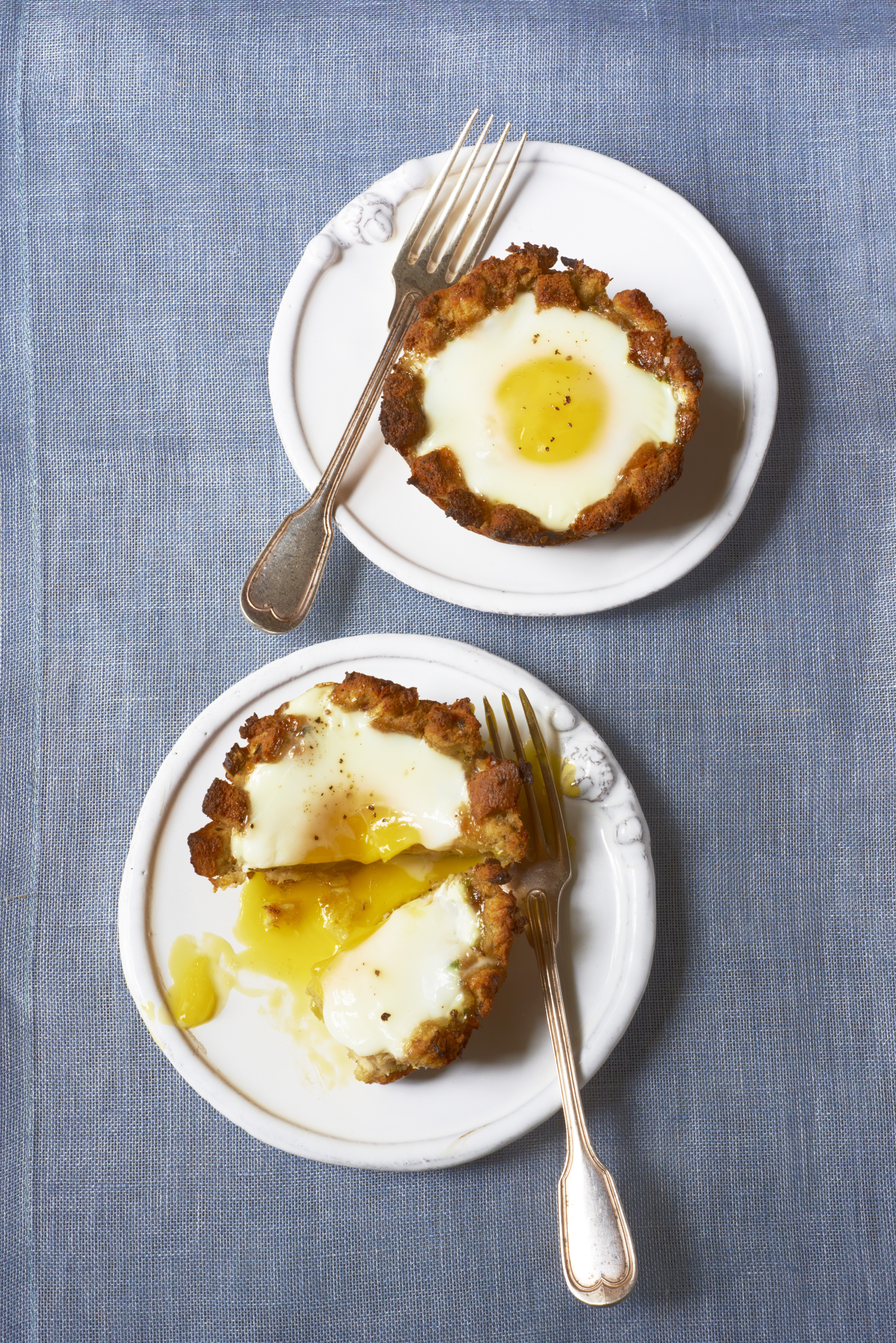 To make Baked Eggs in Stuffing Cups with chunky stuffing, simply chop it with a chef’s knife before starting the recipe. Likewise, if your stuffing is dry and not malleable, add a little broth.