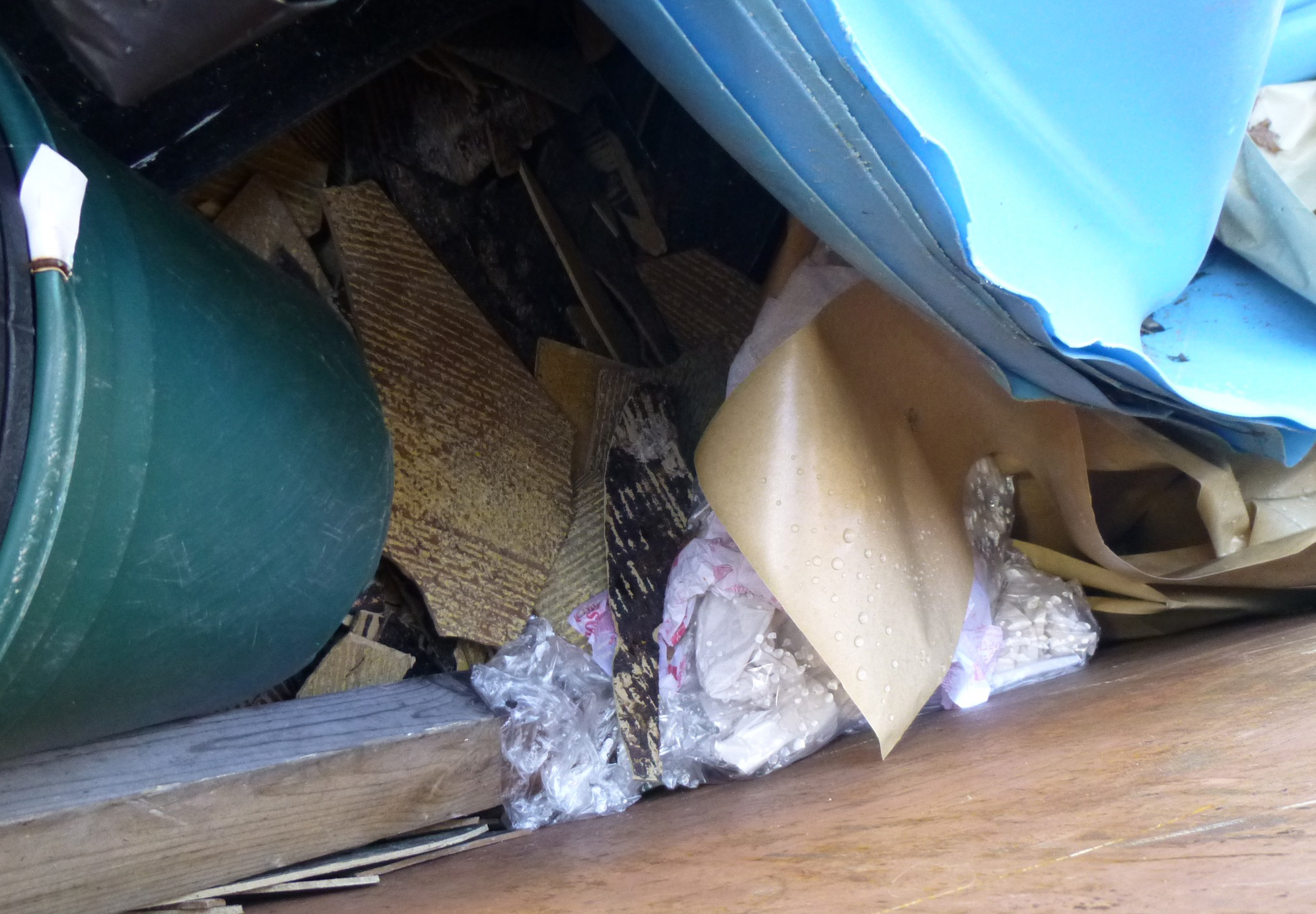 Asbestos tiles that were broken up in classrooms at the McClosky Middle School in Uxbridge, carted through its hallways, and left in a dumpster behind the school for more than a month.