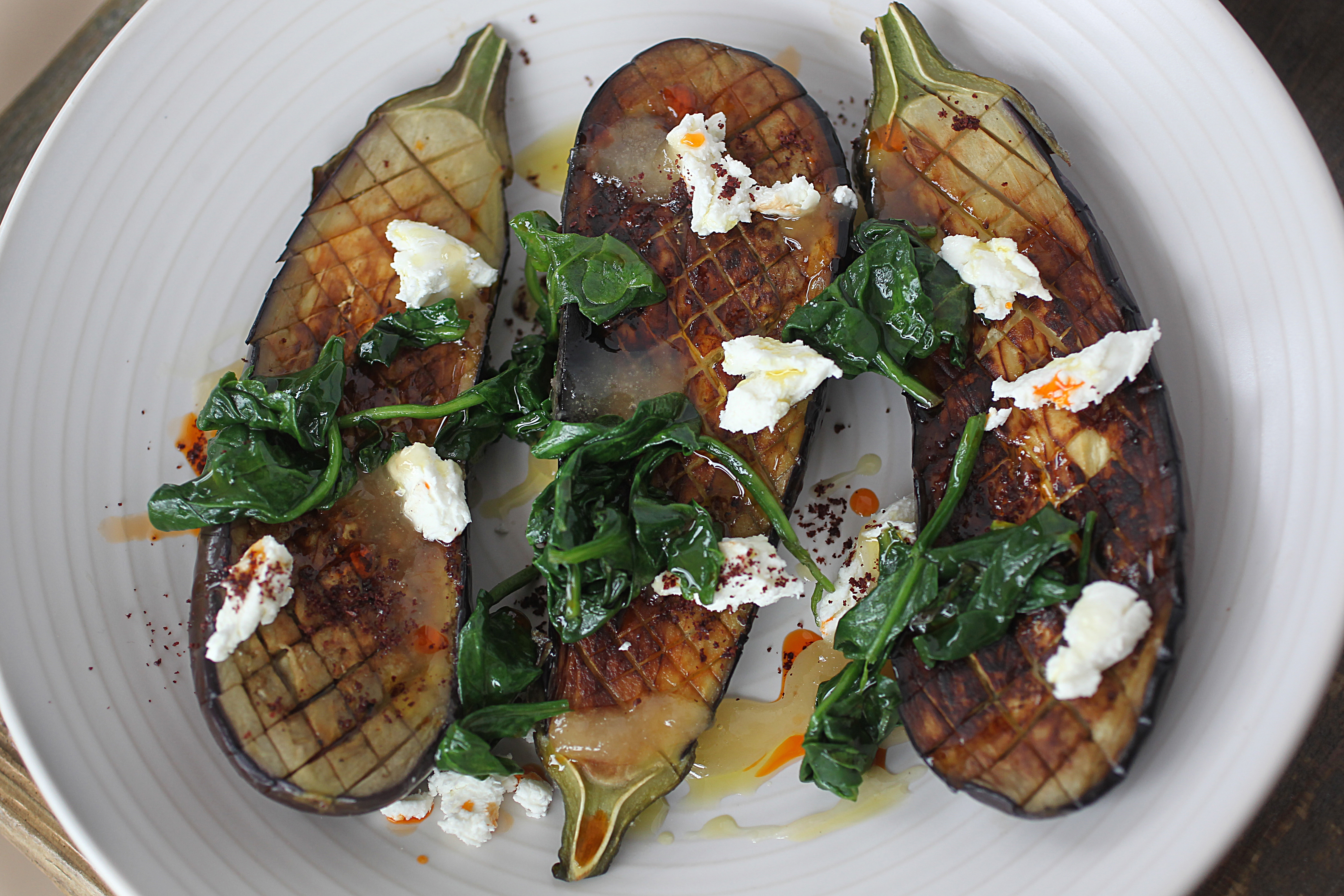 In Concord, Saltbox Kitchen’s roasted eggplant with braised spinach, goat cheese, honey, and sumac.