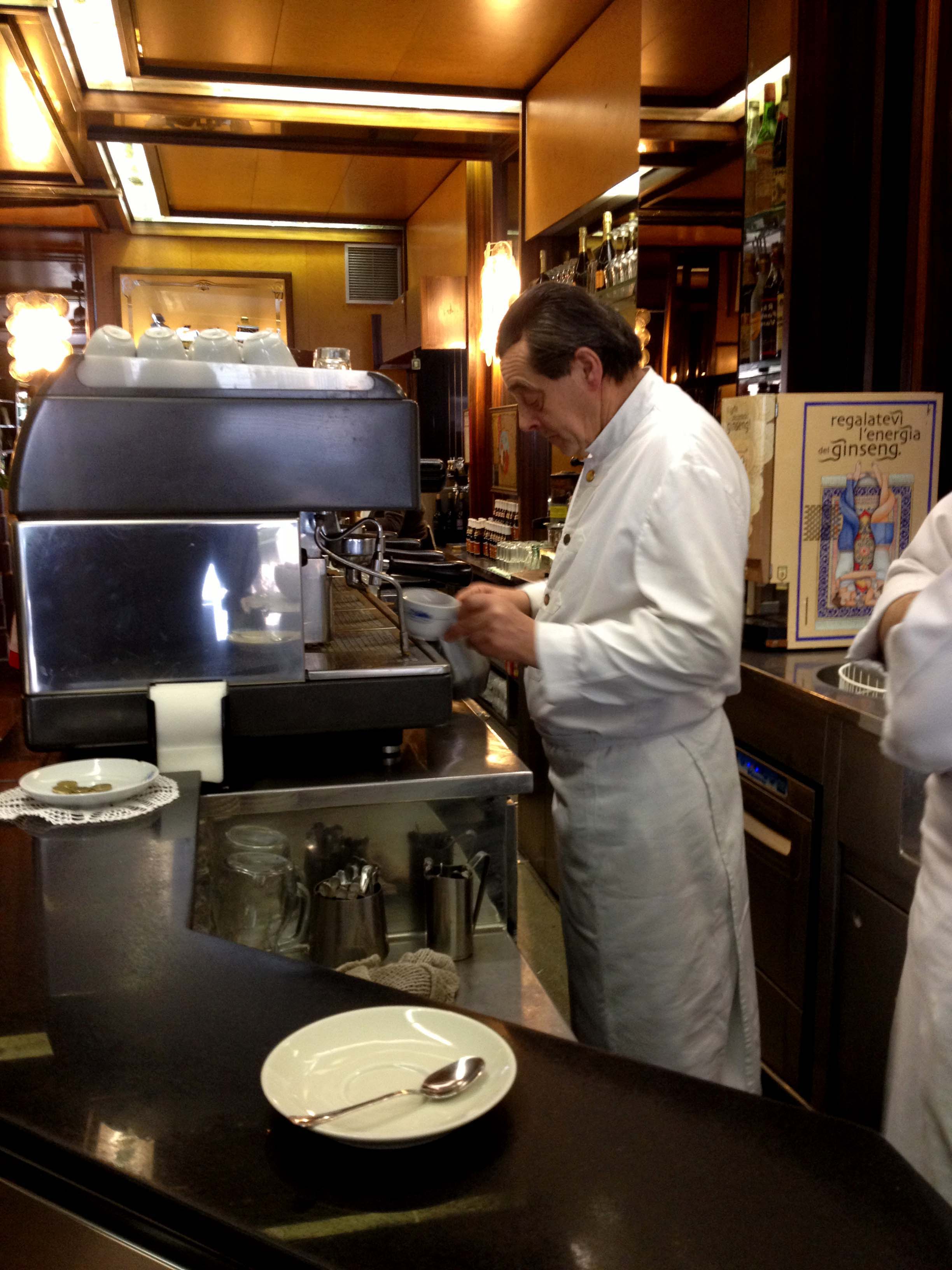 The baristas are dressed for the occasion in Rome, often in crisp white shirts, vests, or bowties.