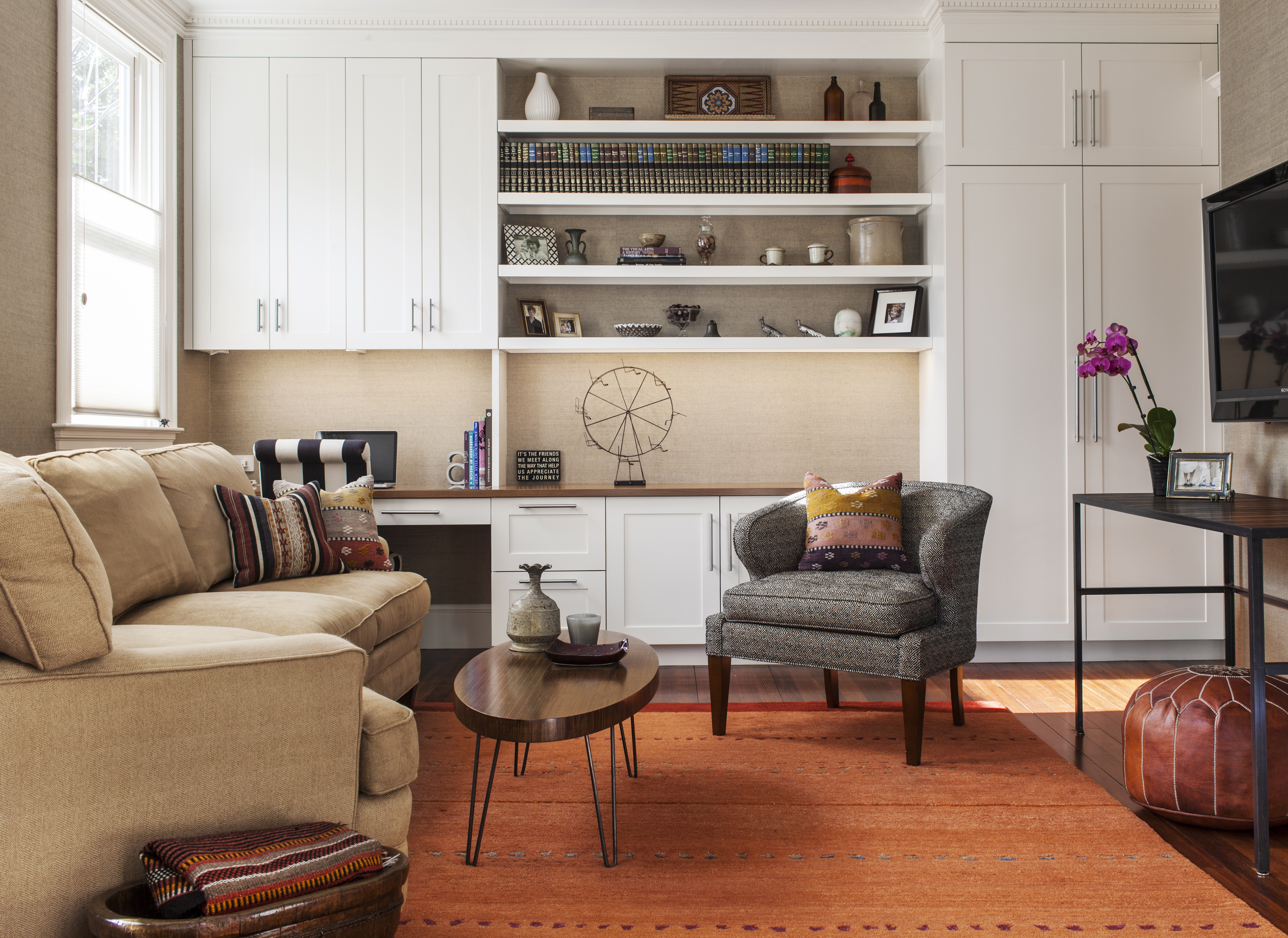 The family room where the Glasses watch television is now just beyond the kitchen.