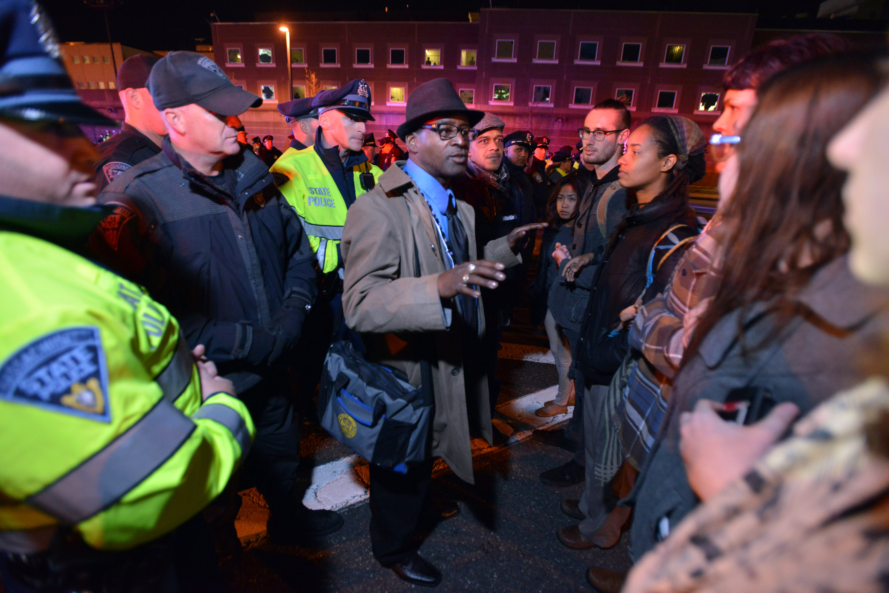 Supreme Richardson, an official with the Boston NAACP, spoke with protesters.