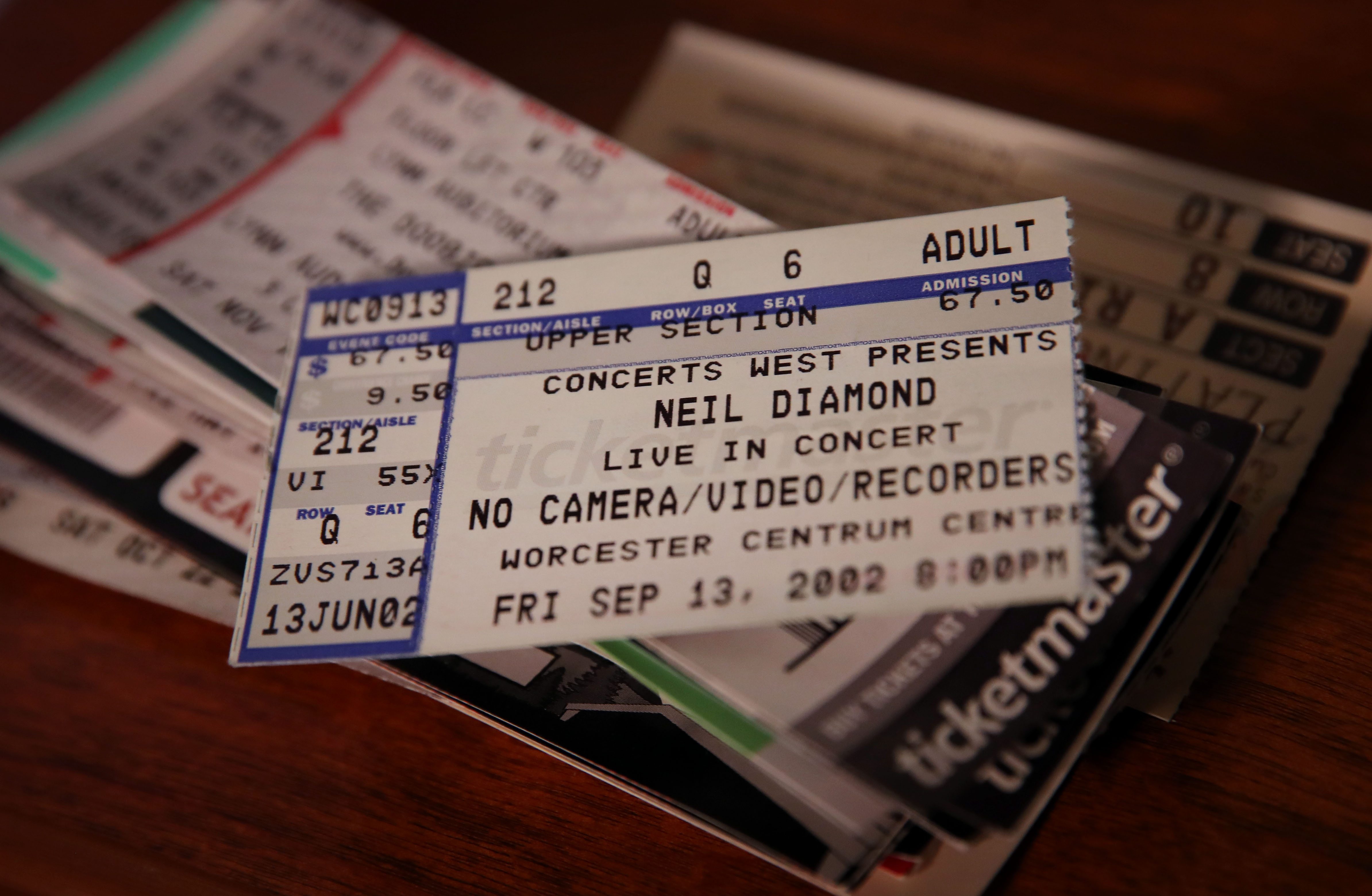 A stack of concert tickets attended by the Irvines.