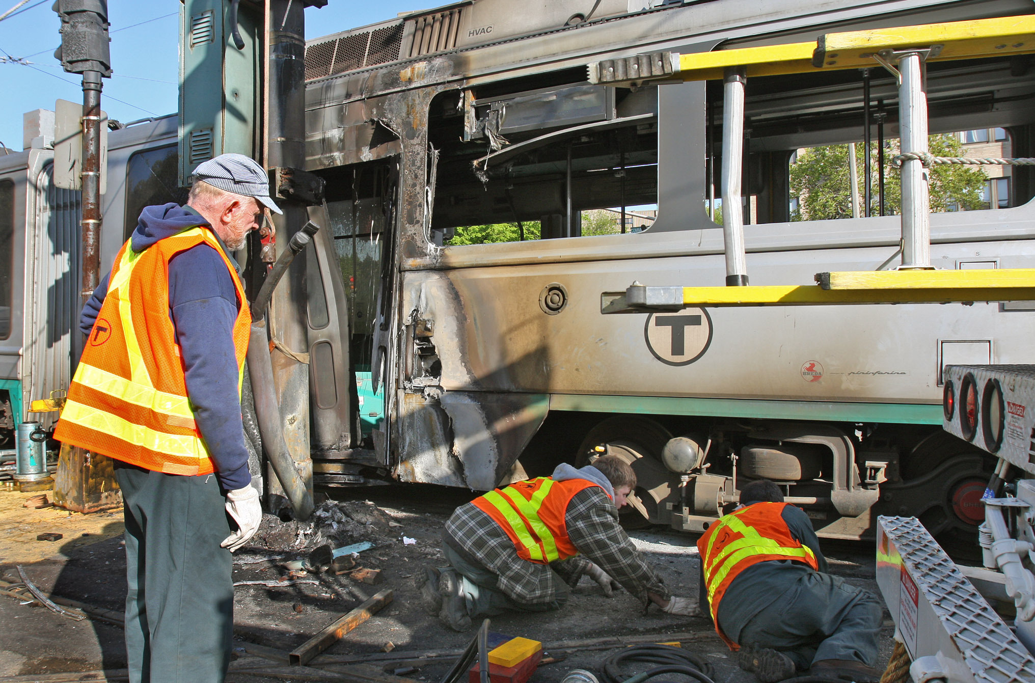 MBTA workers tried to remove a derailed MBTA Green Line train from the intersection of Commonwealth and Chestnut Hill avenues in 2008.