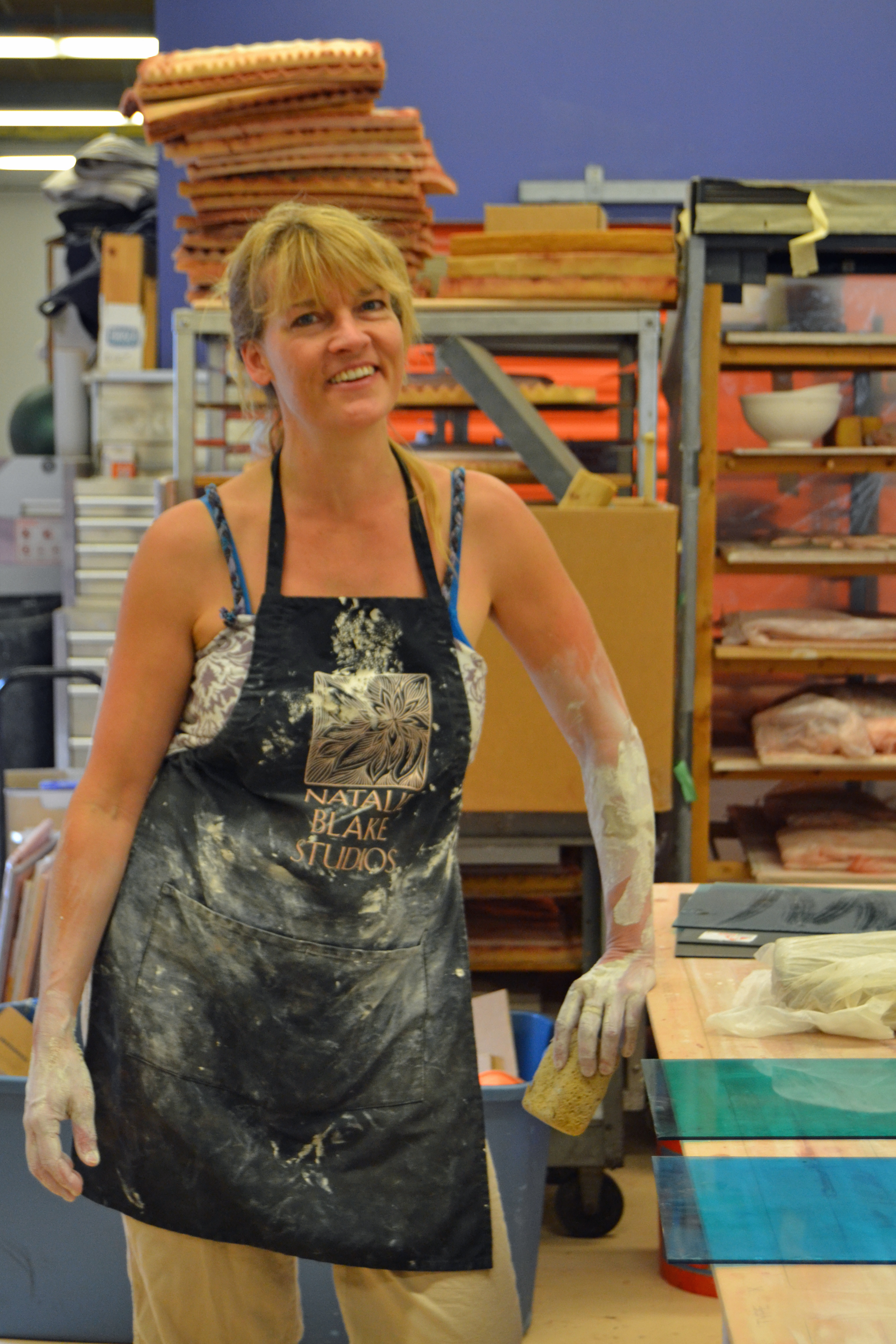 Ceramics and tile artist Natalie Blake at work at the Fulcrum Arts Center and Gallery in Brattleboro.