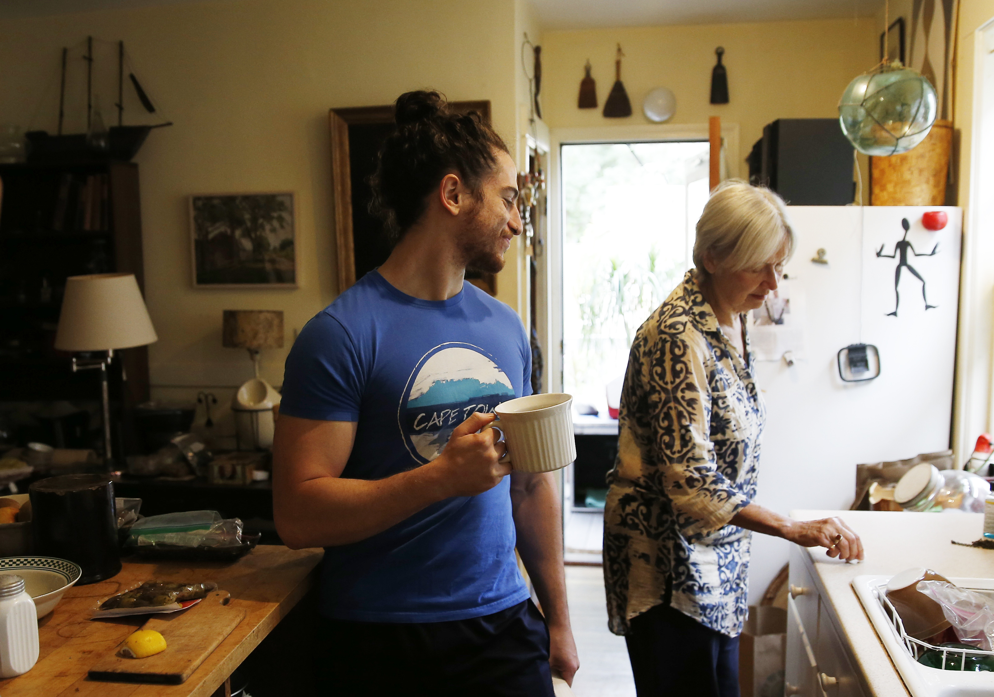 Kaplan and Heintz chatted in the kitchen.