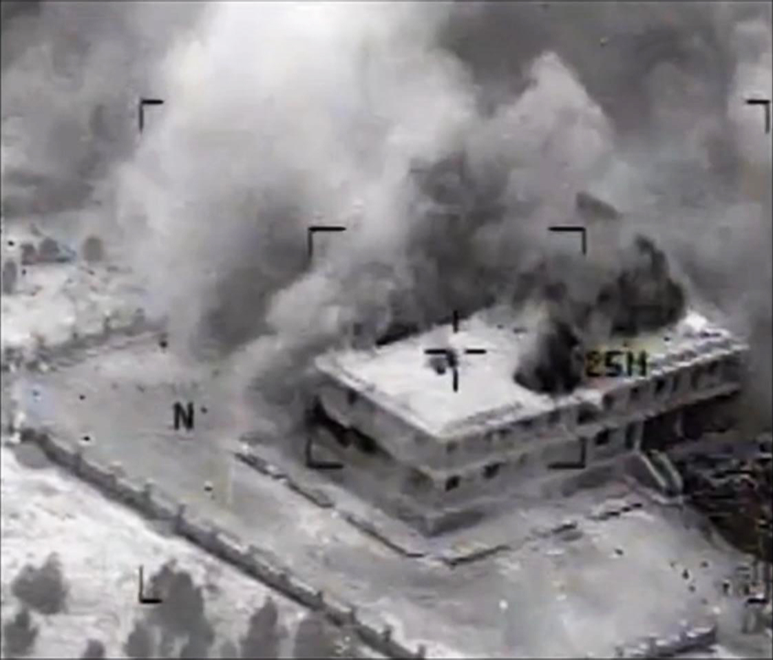 A structure in Tall Al Qitar, Syria, is seen moments after a US strike on Tuesday in one of more than 200 air strikes against militant targets.