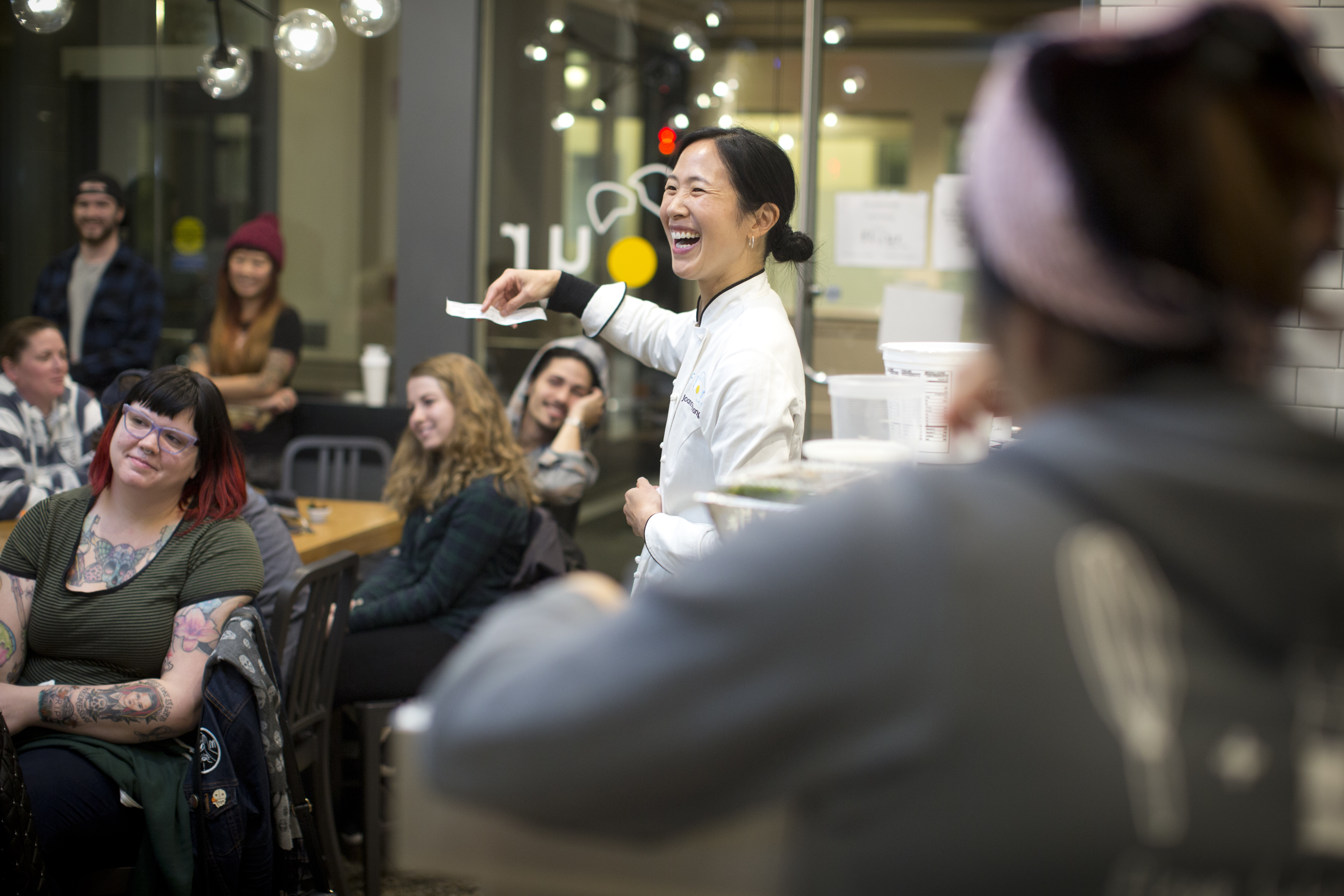 Chang leads a staff meeting at the South End Flour.