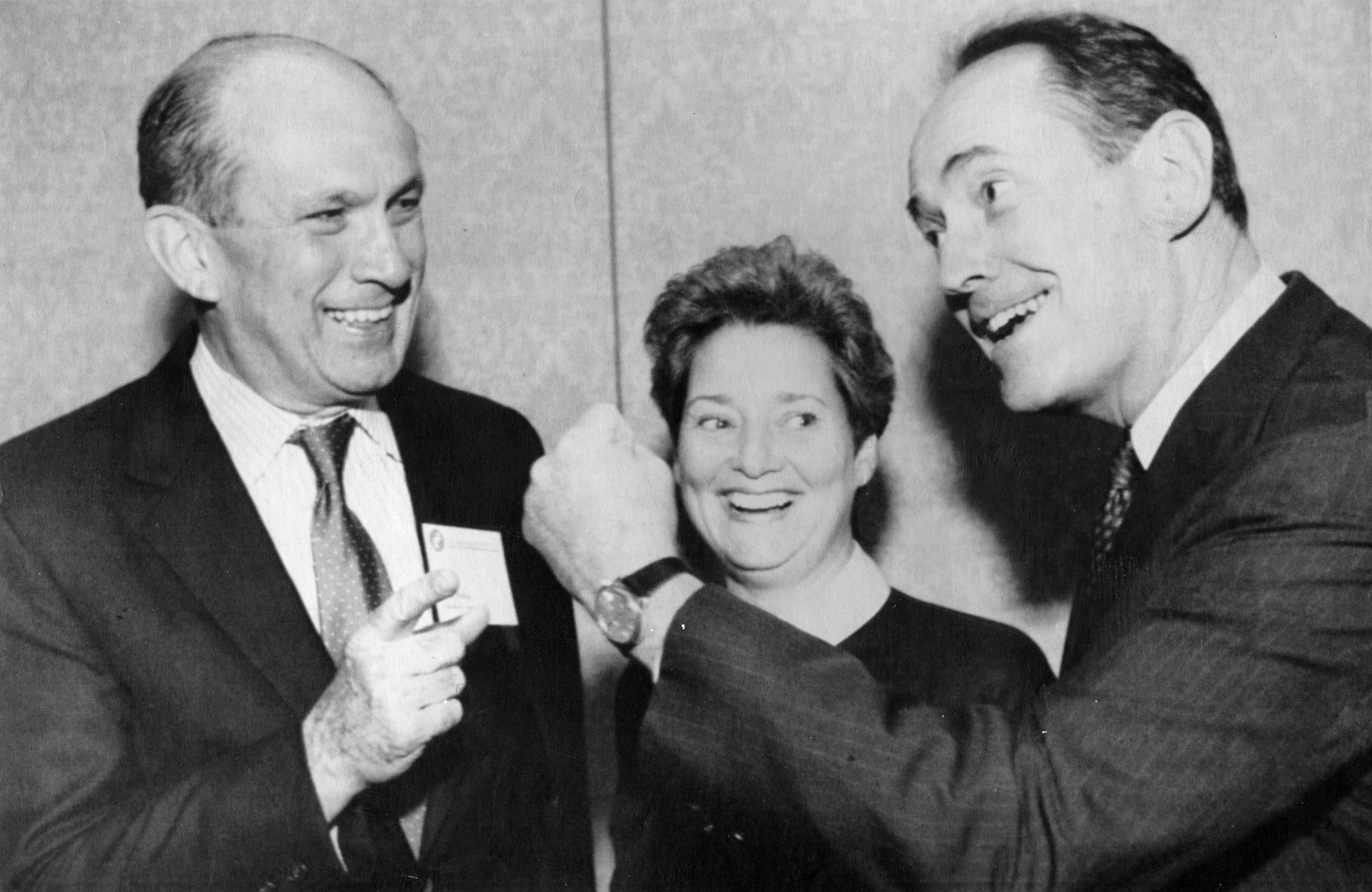 US Attorney General Richard Thornburgh (right) joked with Mr. Phillips after the Raytheon chairman and CEO was awarded the annual “New Englander of the Year Award” in Boston. With the two was Bonnie Newman.