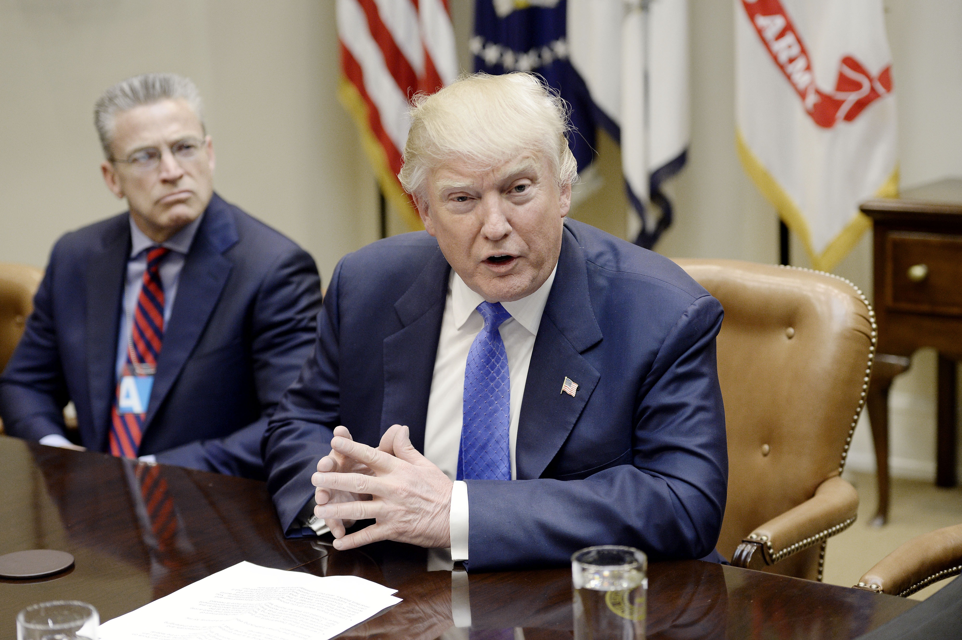 President Donald Trump (right) spoke at the White House on Thursday.