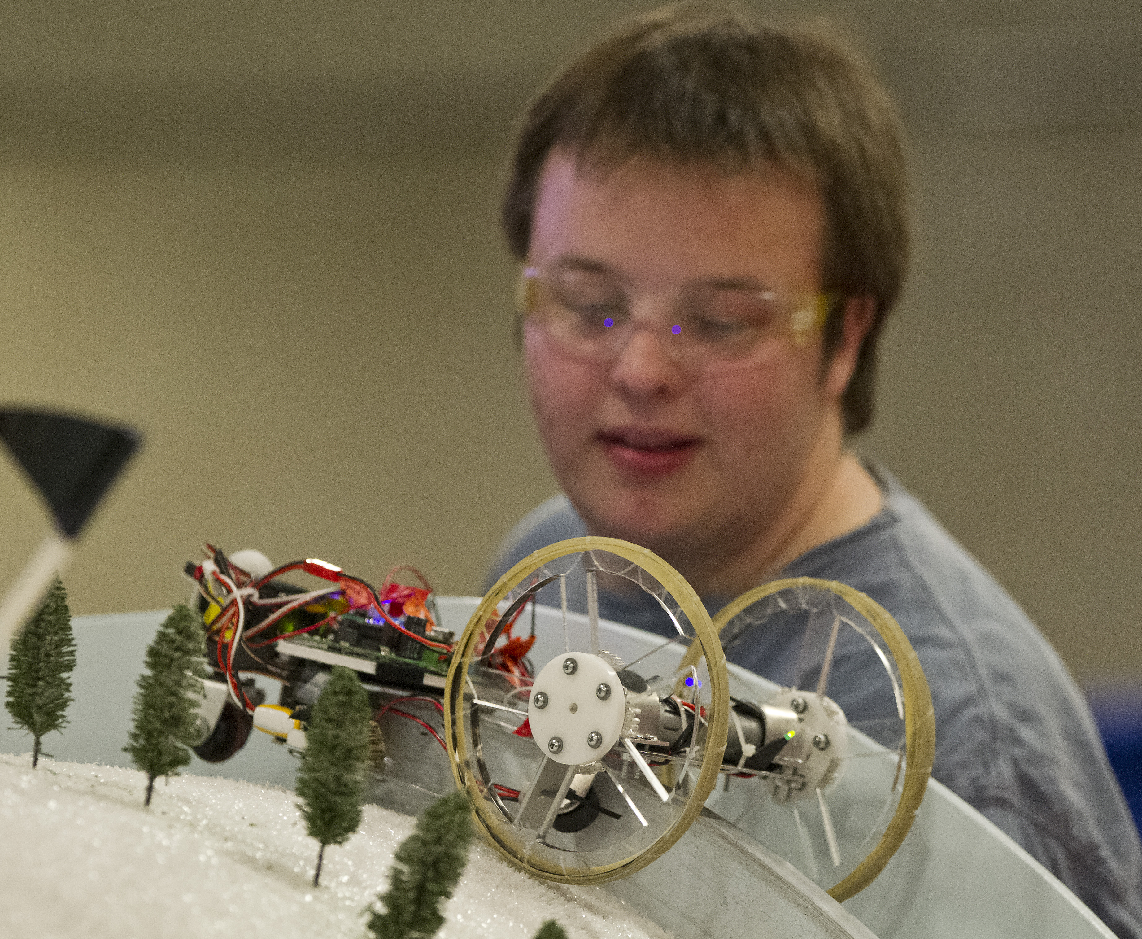 Beckett Colson watched as his robot, Odd Ball One, got stuck at the top of the ski slope during the MIT robotic skiing competition.