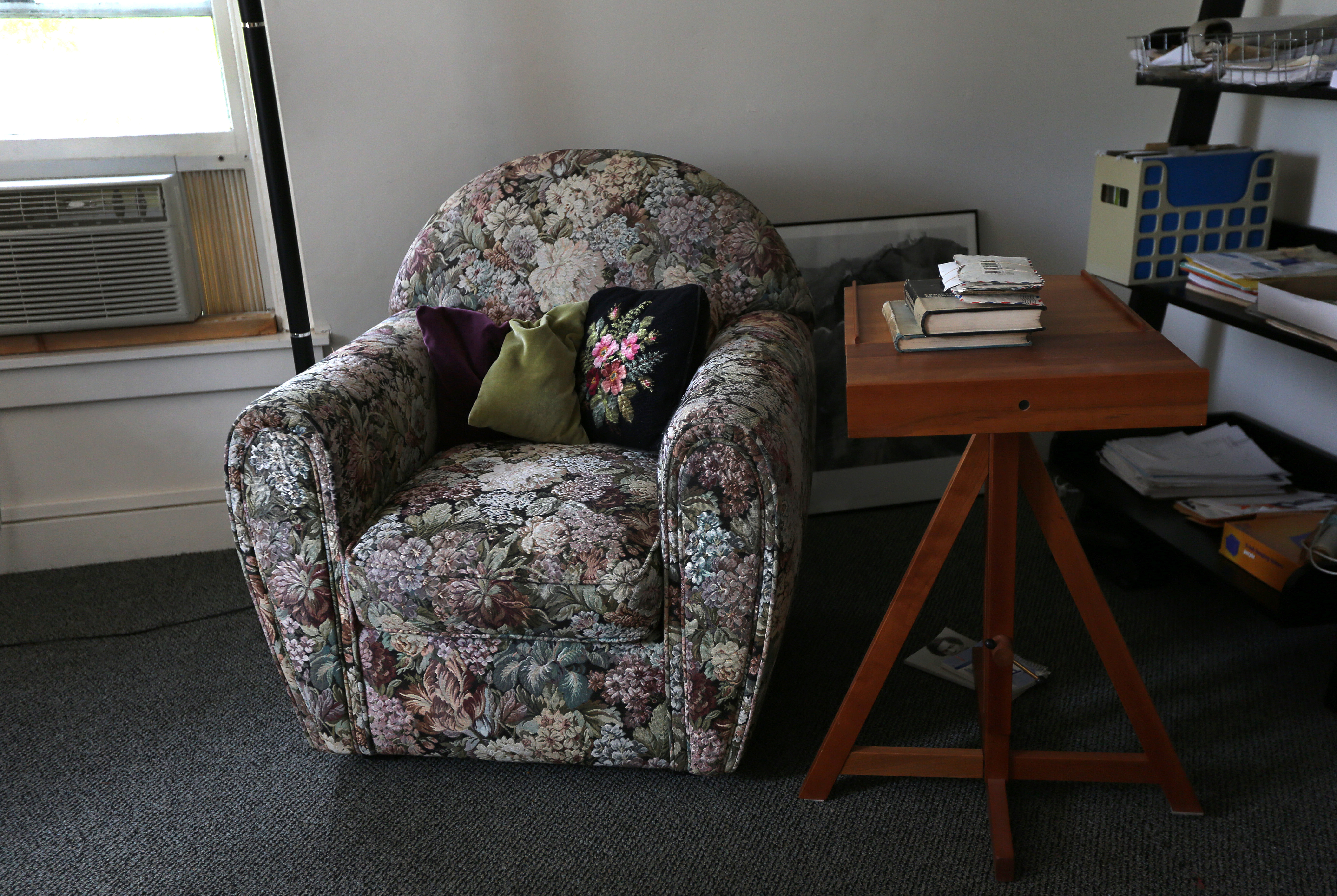 She has an easy chair just for reading.