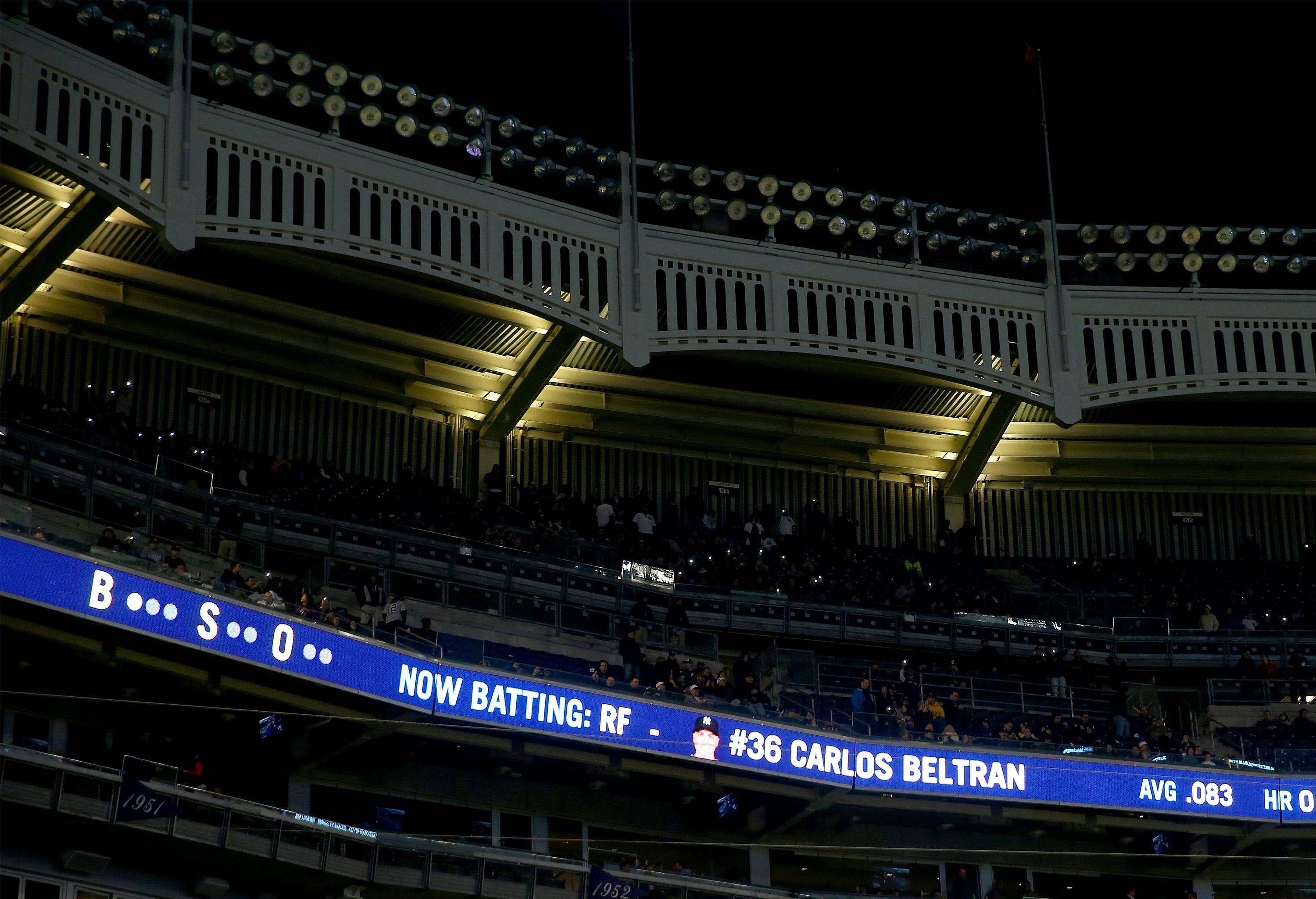 A bank of lights in Yankee Stadium went out in the 12th inning and delayed the game briefly.