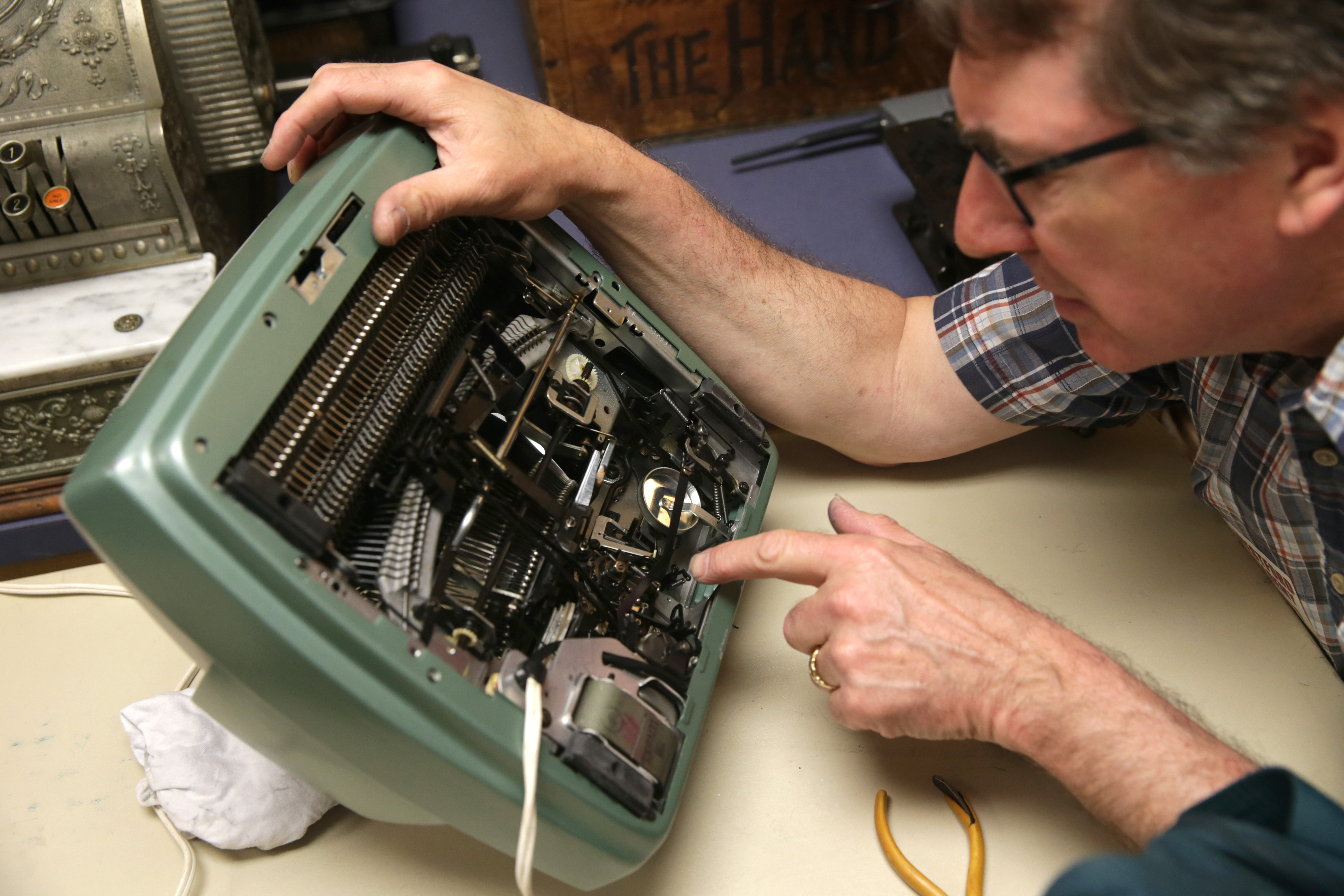 Tom Furrier, owner of Cambridge Typewriter, visited Westford Academy to service some of the school’s antique typewriters, which are used in history classes so students can experience past technology.
