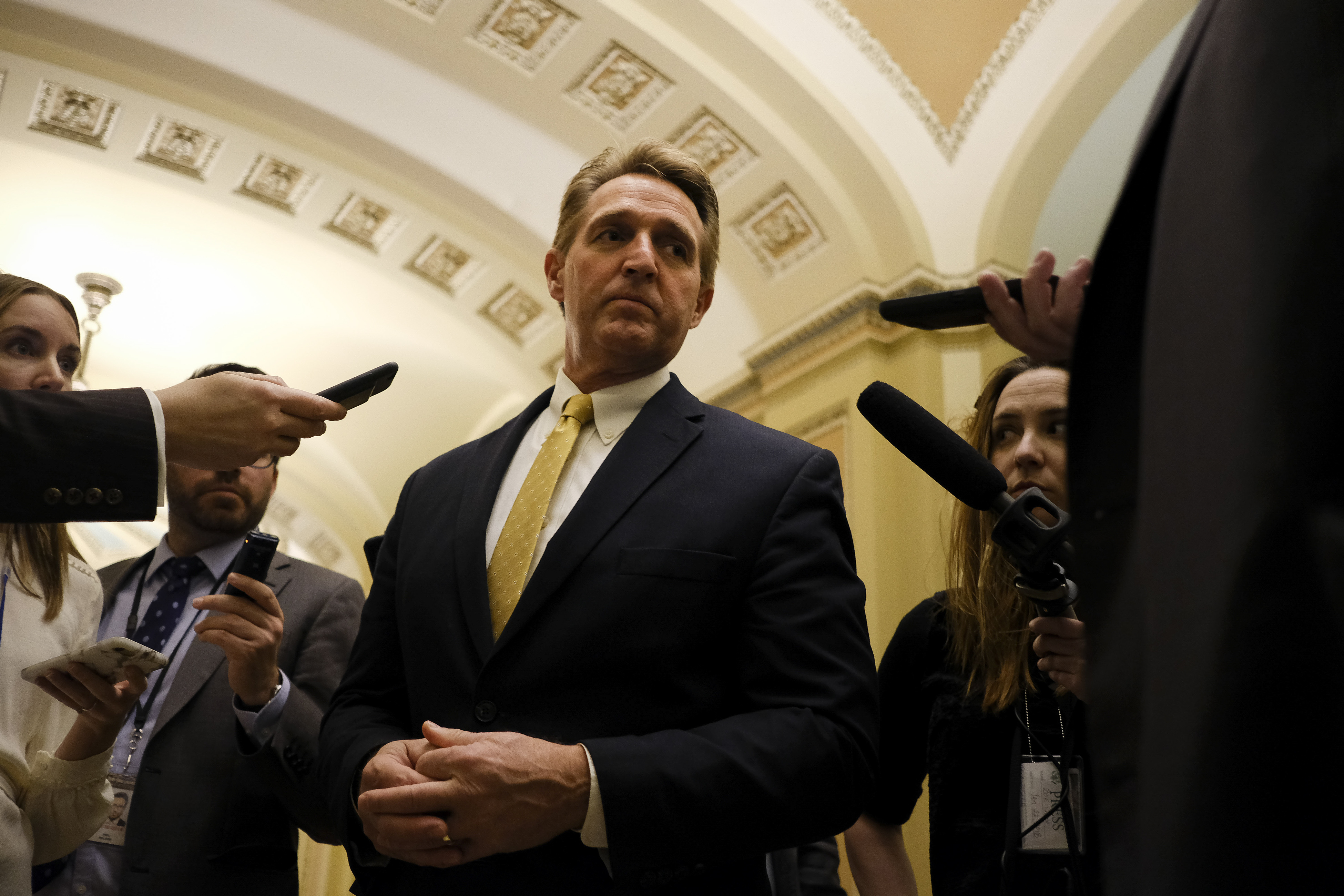 Senator Jeff Flake spoke to reporters at the Capitol in Washington.
