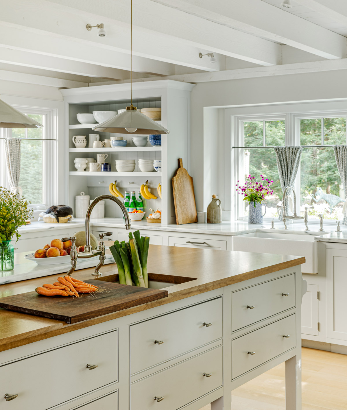 Sleek yet natural, this island centers the functional, family-focused kitchen.