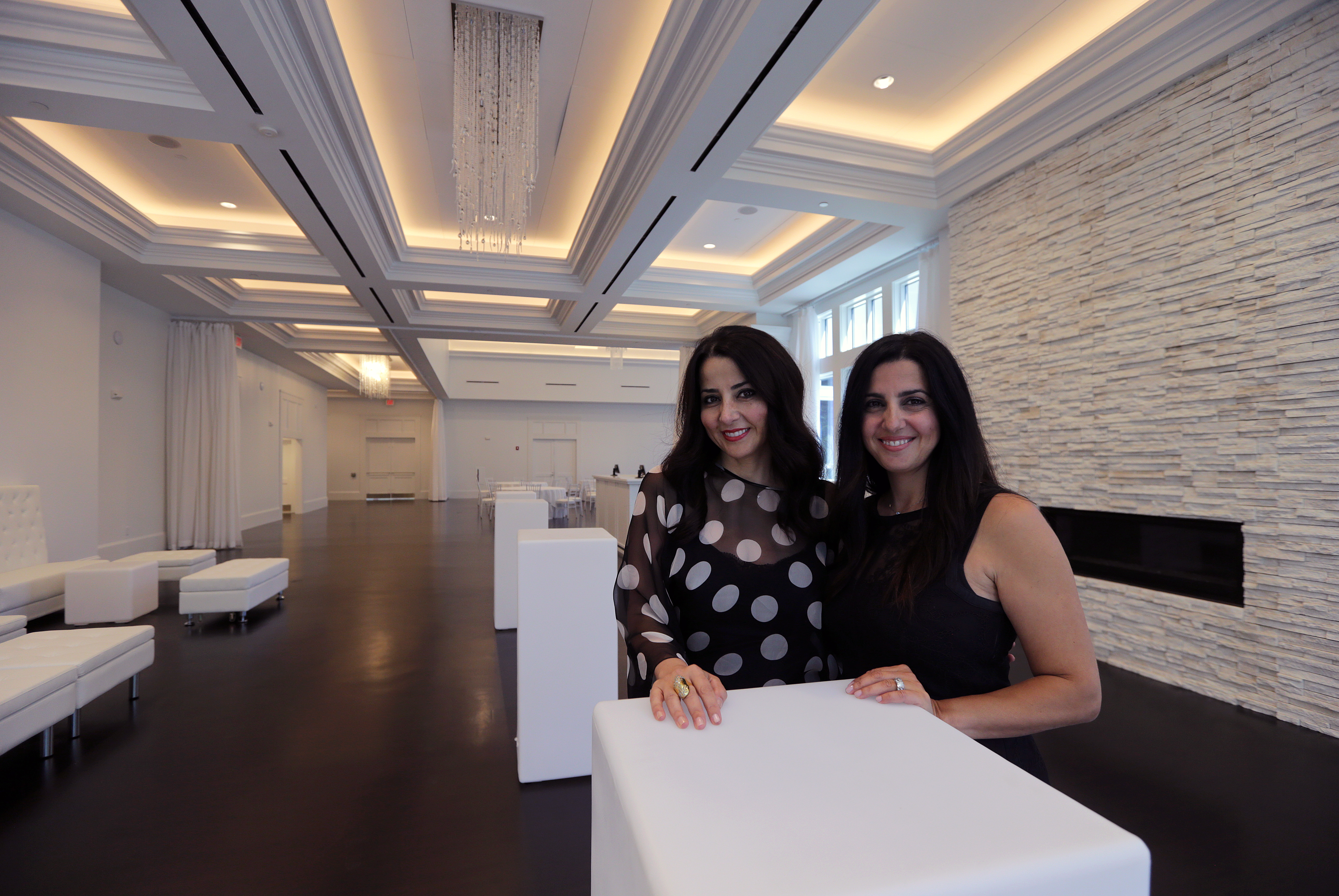 Natalia Kapourelakos (left) and Anastasia Tsoumbanos at the rebuilt Lakeview Pavilion.