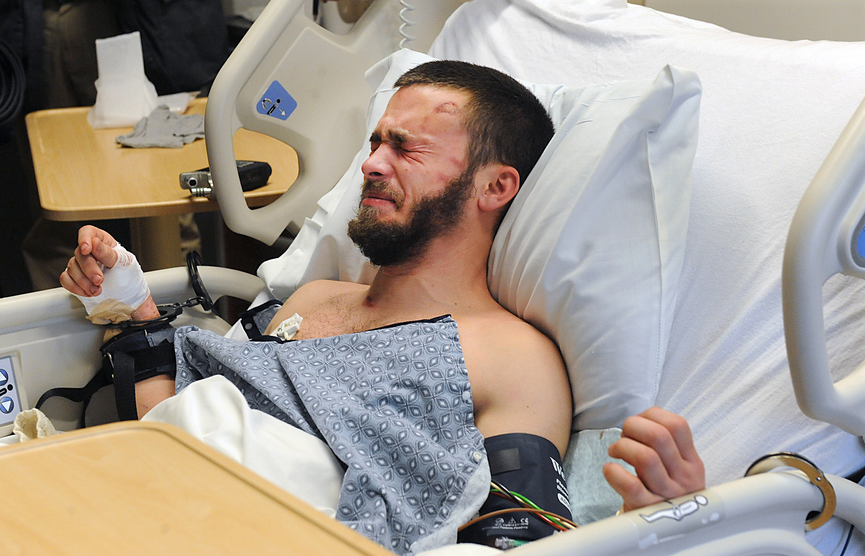 Benjamin Walsh was arraigned Monday in his room at Milford Regional Medical Center.