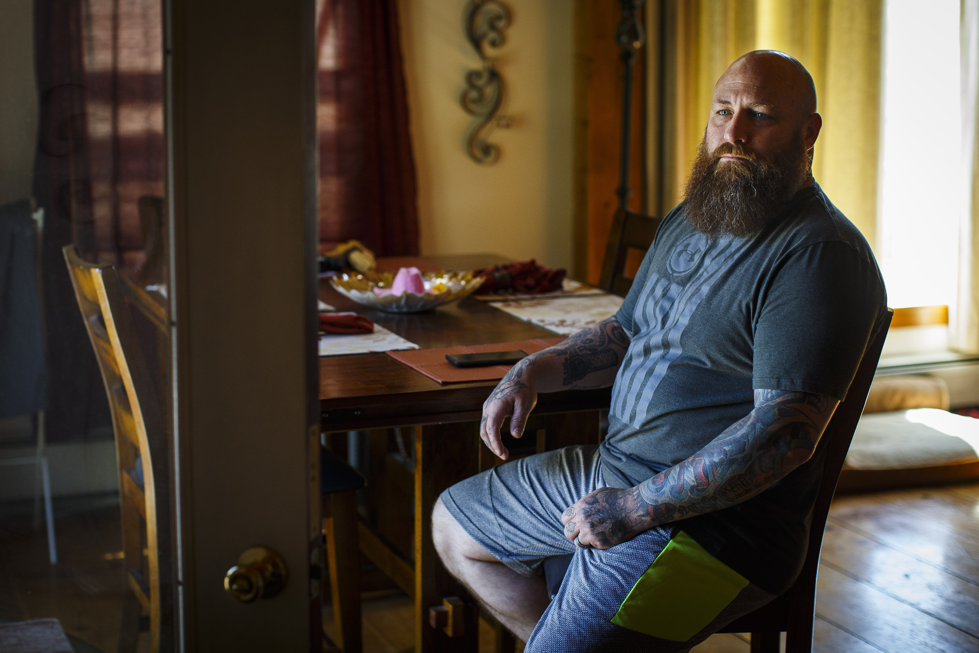Michael St. Cyr, an Afghanistan war veteran, at his home in Campton, N.H. He suffered a broken neck during Army fitness training in 2000, and never fully recovered. For two years, starting in 2014, he visited or called the Manchester VA many times complaining of chronic pain. Finally, new images showed that surgical screws in his neck had come loose. A private surgeon then operated on his neck and relieved the pain.