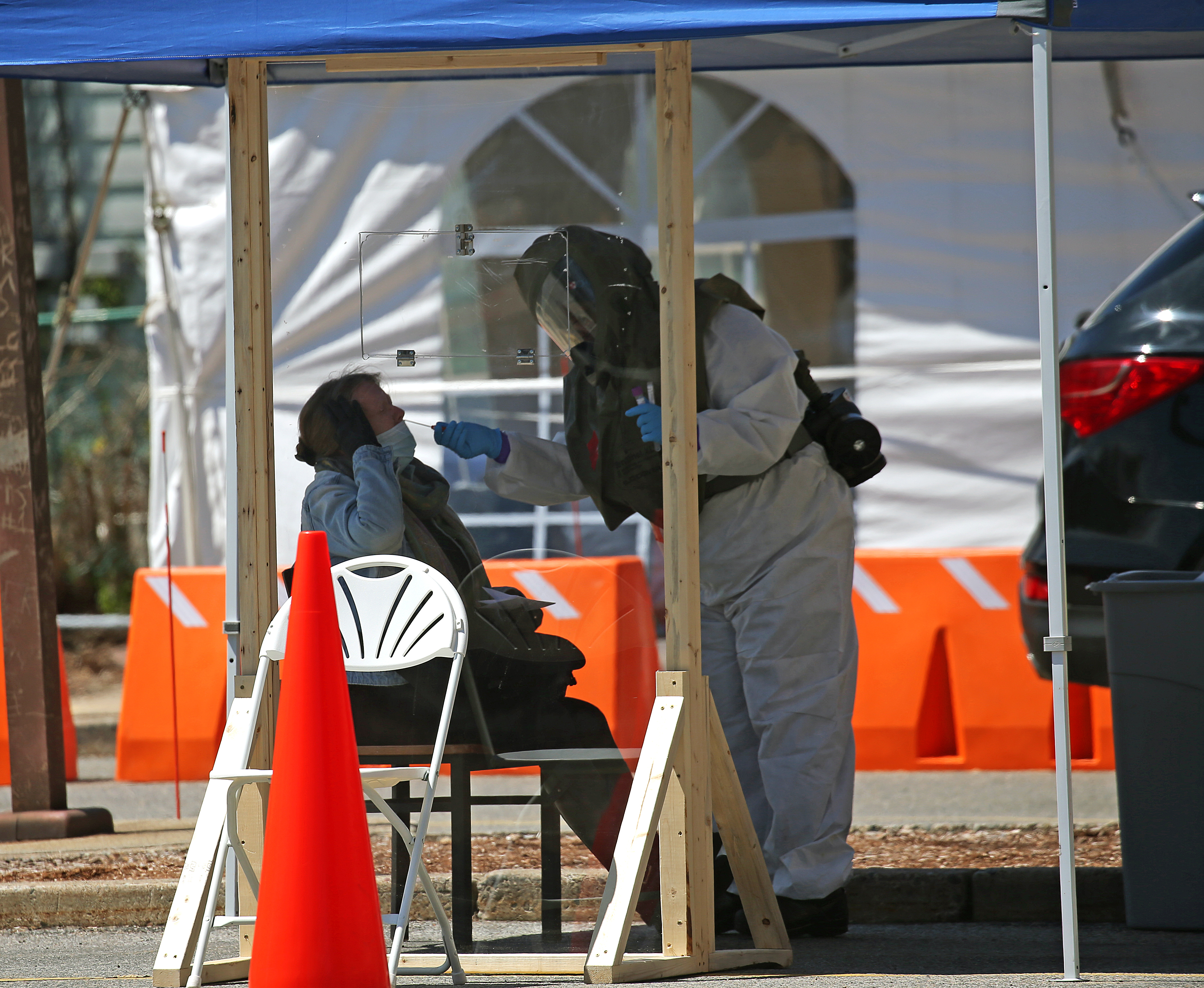 A hospital staff member treated a a patient in Somerville last week.