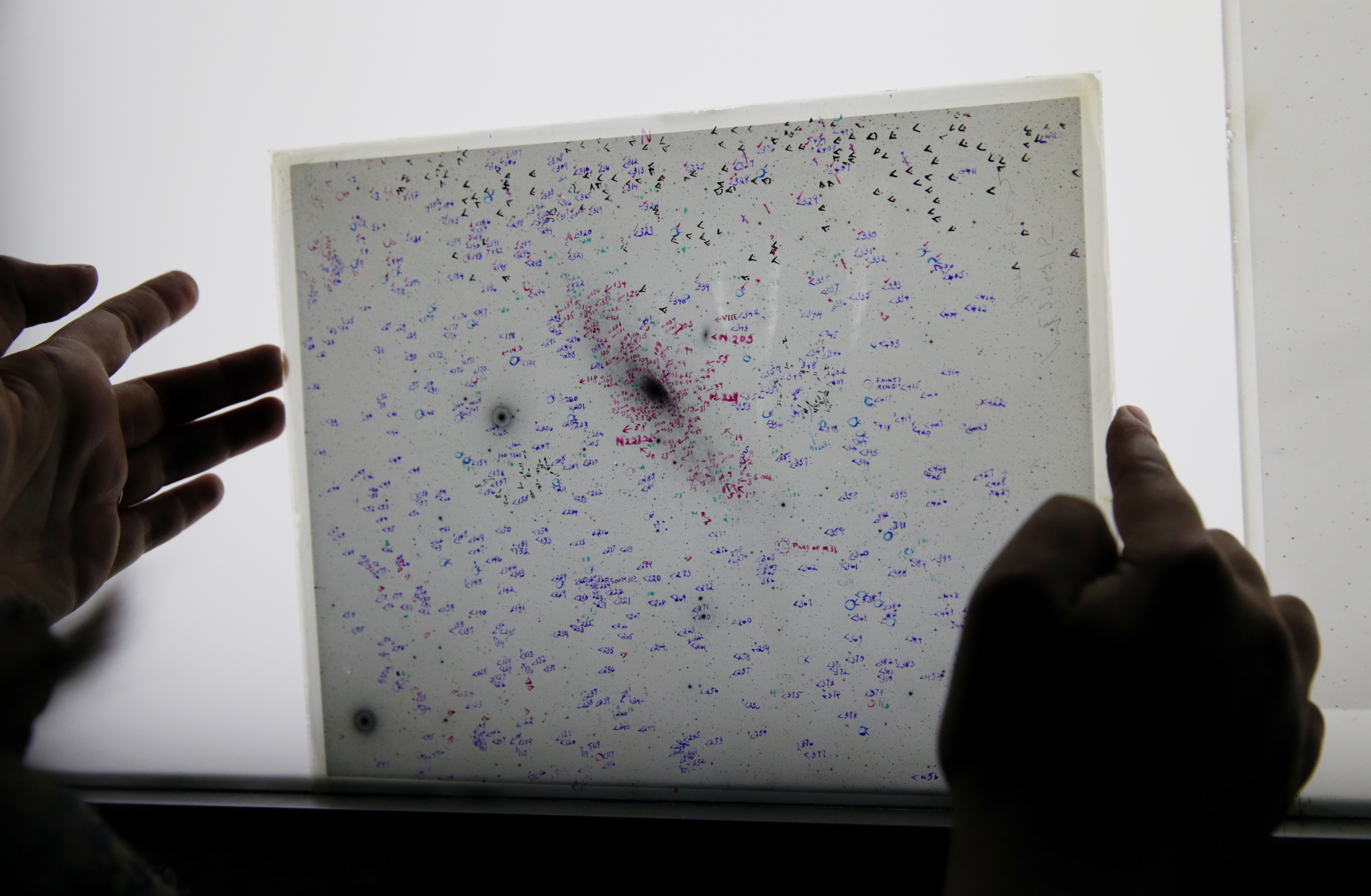 A 1934 glass galaxy count plate negative at Harvard Smithsonian Center for Astrophysics.