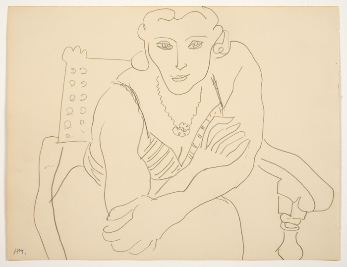 “Femme en fauteuil (Woman in a chair).”
