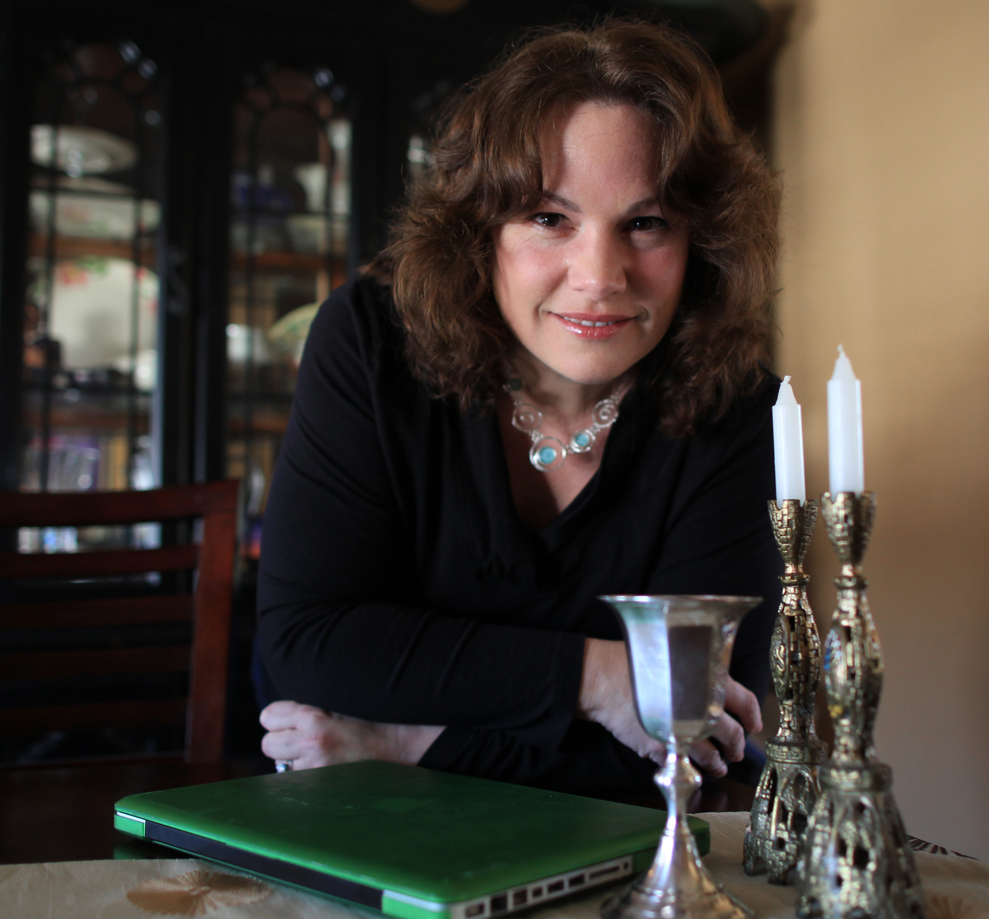Linda Freeman Goodspeed will be using a laptop to include family members from western United States during Passover Seder at her home in Beverly.