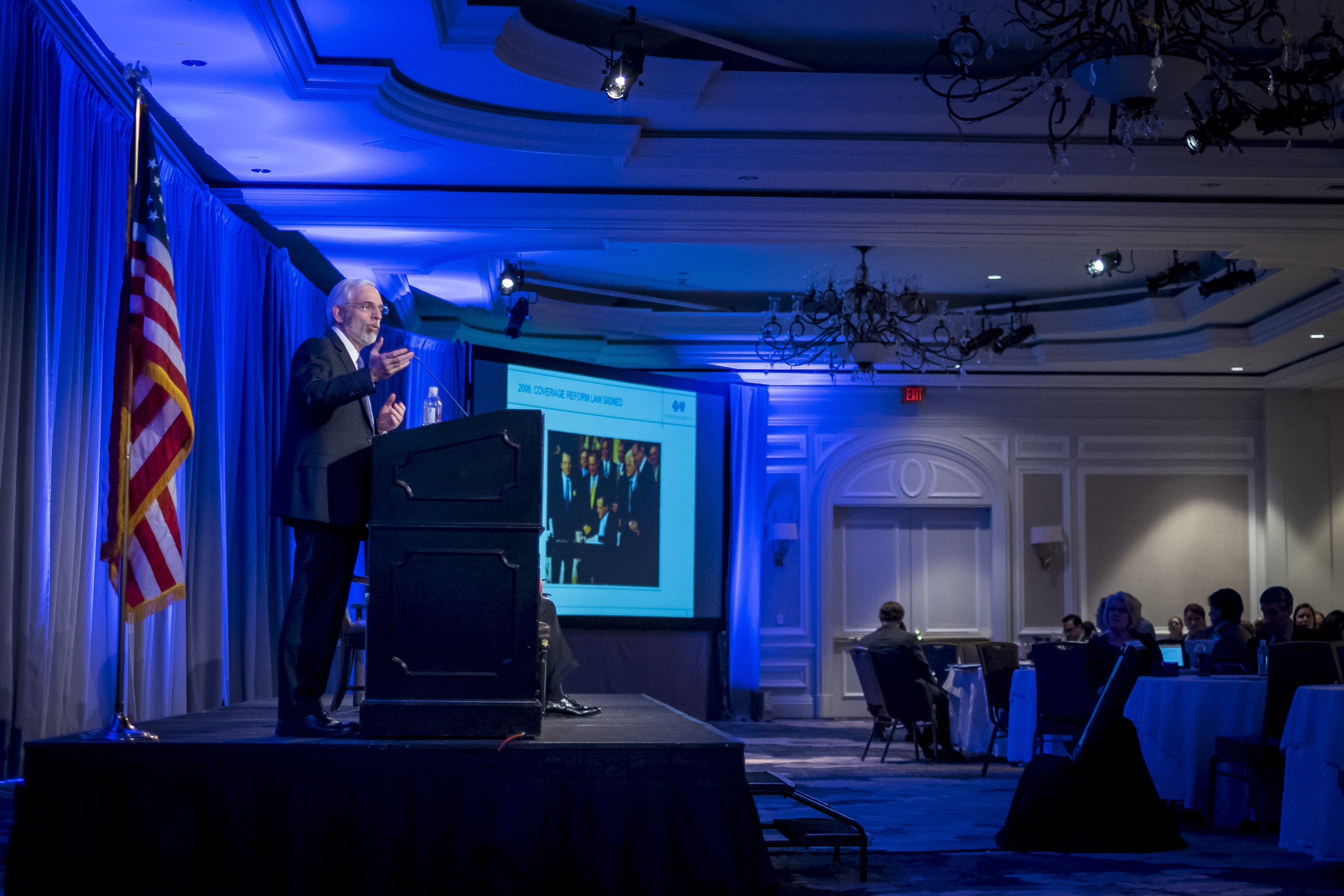 Blue Cross Blue Shield’s Andrew Dreyfus has been giving talks around the nation insisting health reform can work. Here, he makes his case to insurance execs in Washington, D.C., in March.