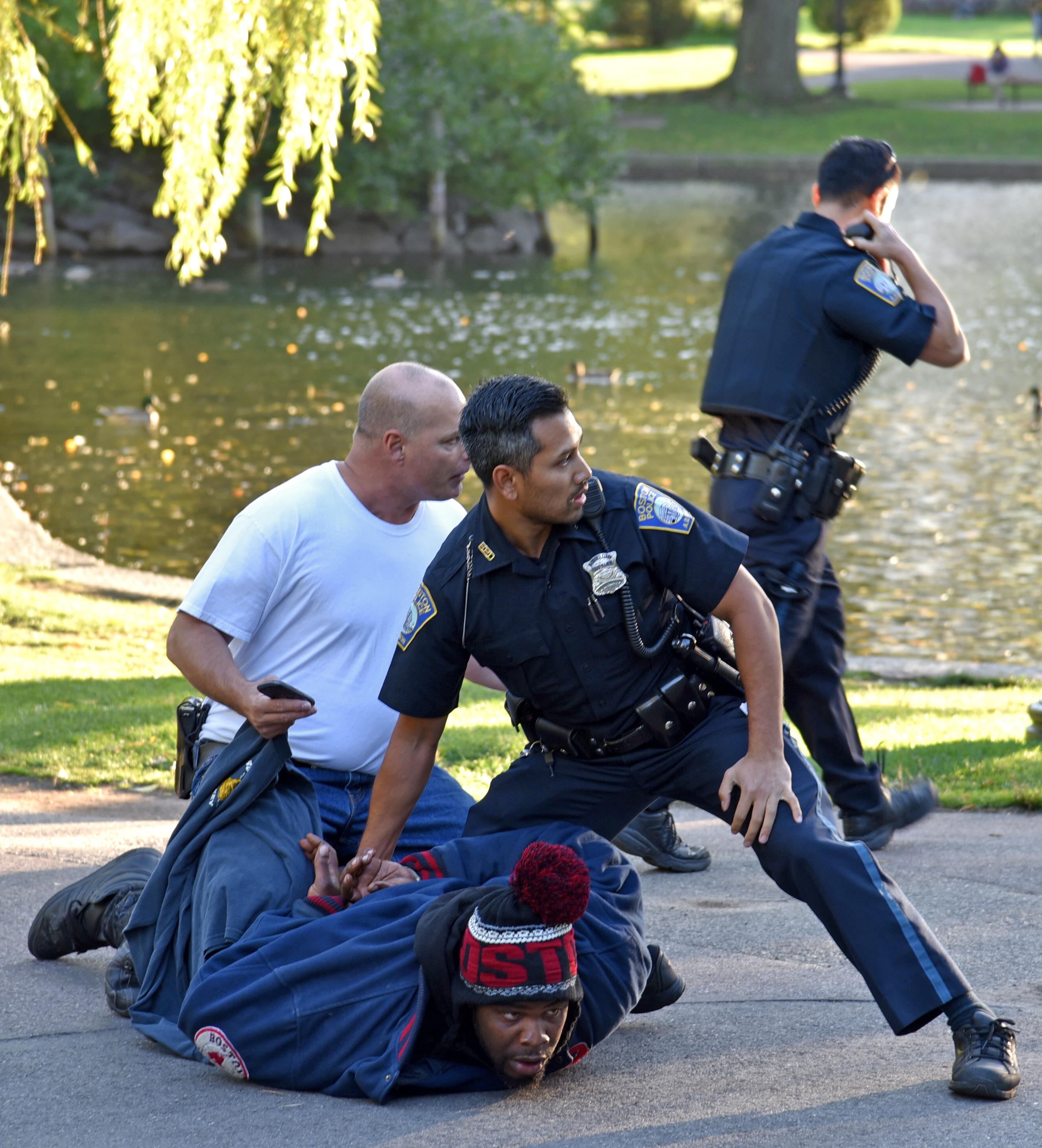 Boston Police chased Bodio Hutchinson, 34, into the Public Garden, where they arrested him and fished a knife out of a nearby pond, officials said.
