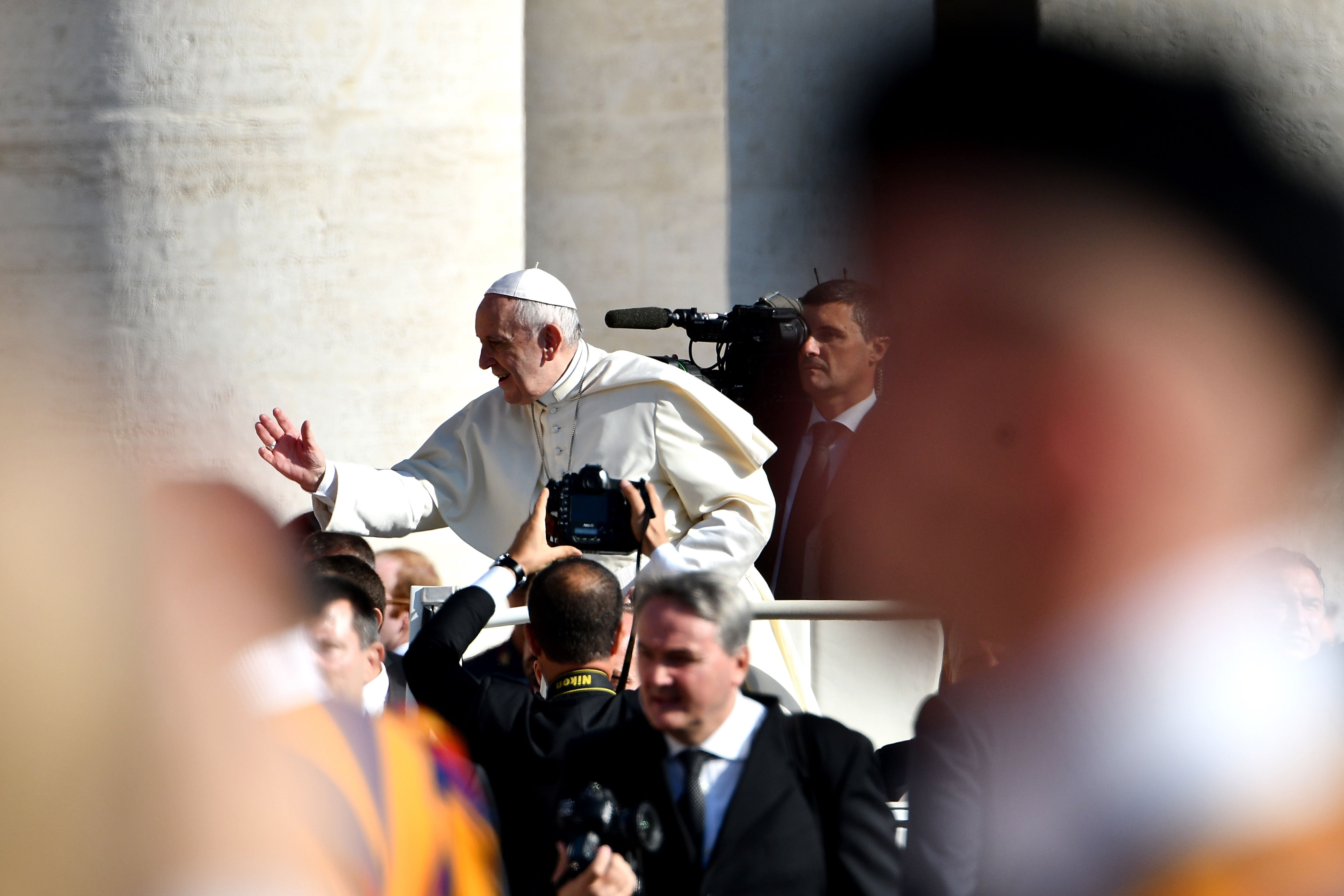 Pope Francis waved to the faithful Wednesday upon his arrival at St Peter's Square.