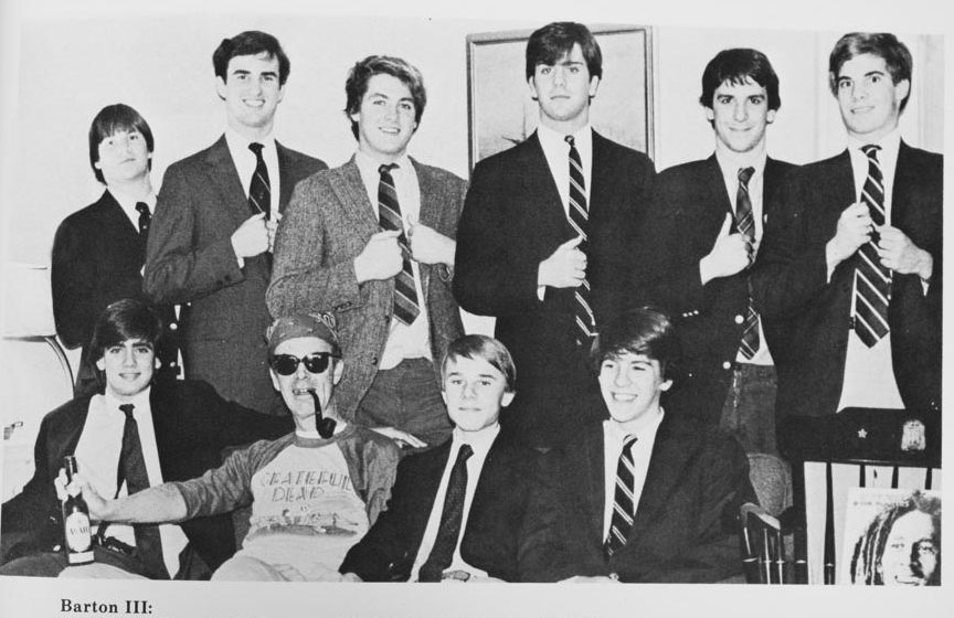 From Deerfield’s 1983 yearbook: Teacher and coach Peter Hindle posing with his dorm charges (with pipe), including author Whit Sheppard (front row, far right).