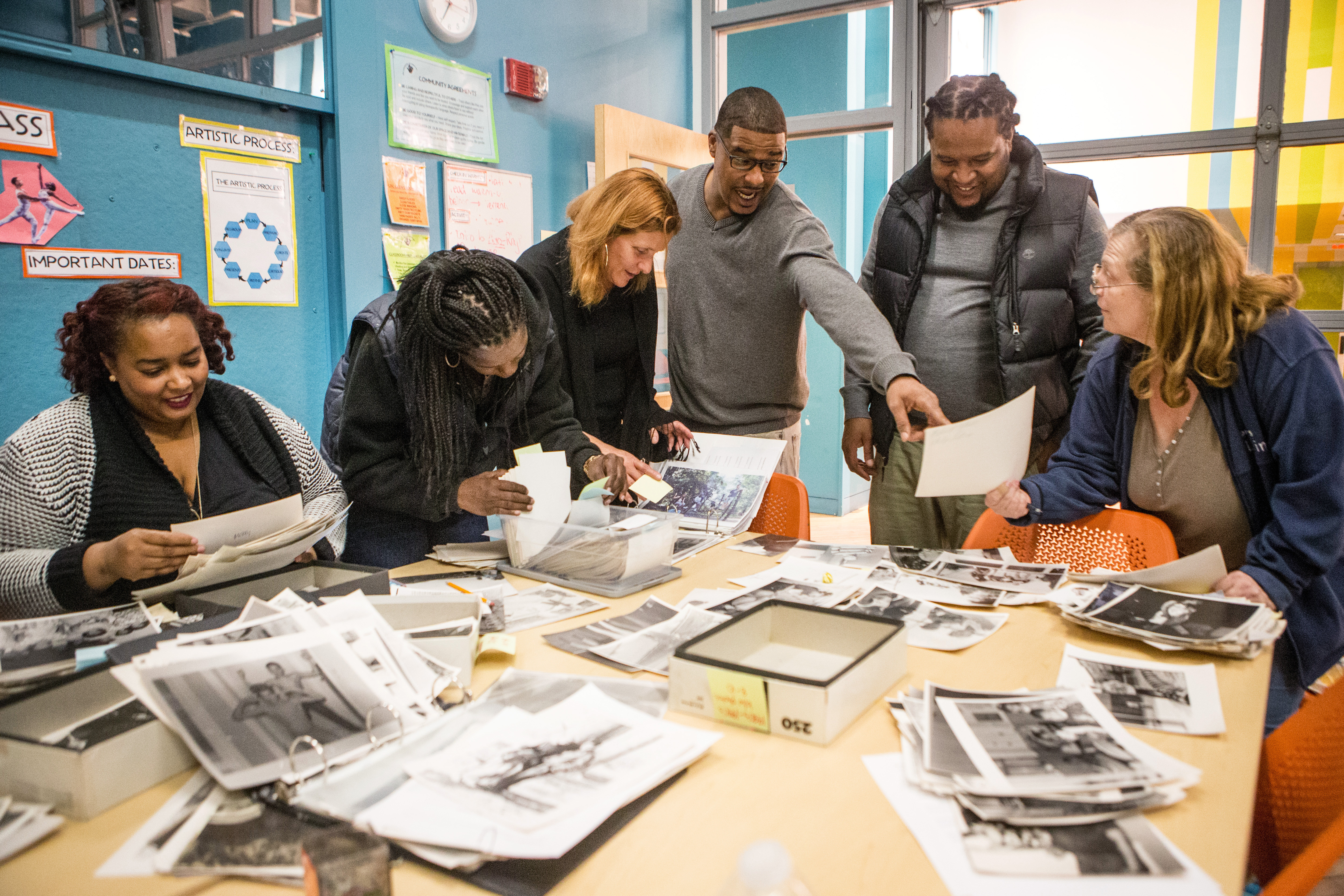 Almost all of the photos are undated, and the only way to identify the people in them is to show the pictures to those who grew up in the neighborhood. Then names and memories flow.