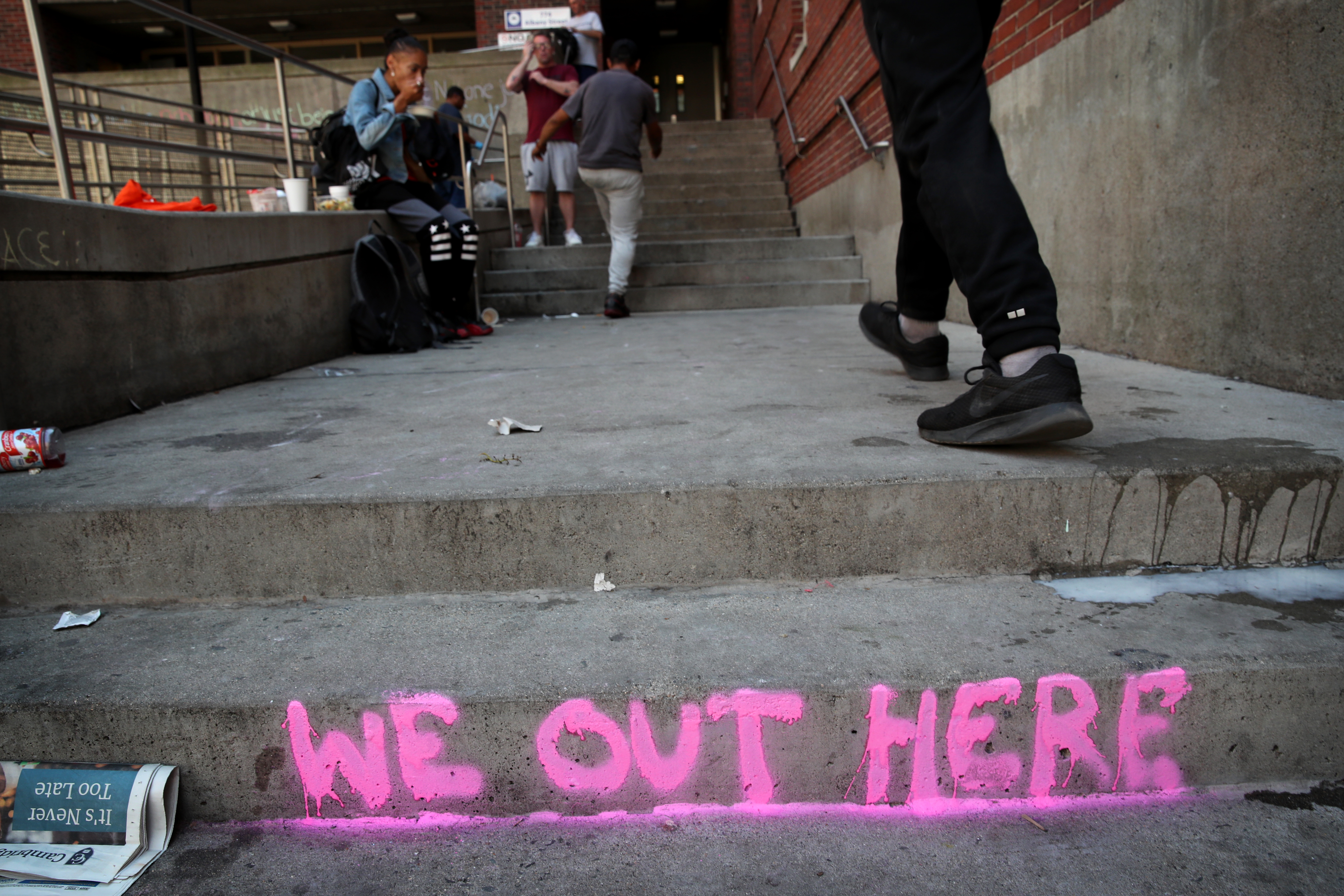 A message written on the steps outside the Boston Public Health Commission on Albany Street in Boston.