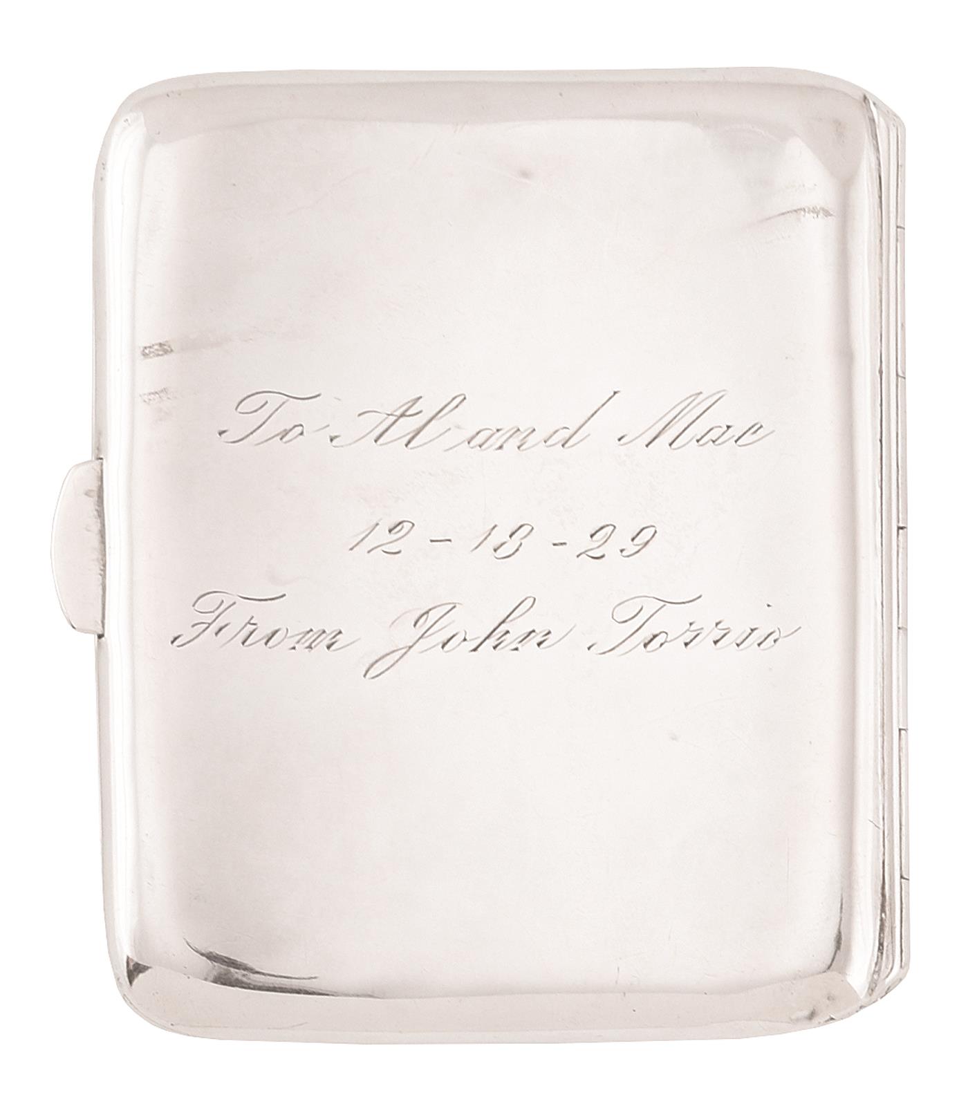 Johnny Torrio gave this engraved cigarette case to Al Capone and his wife on their wedding anniversary.
