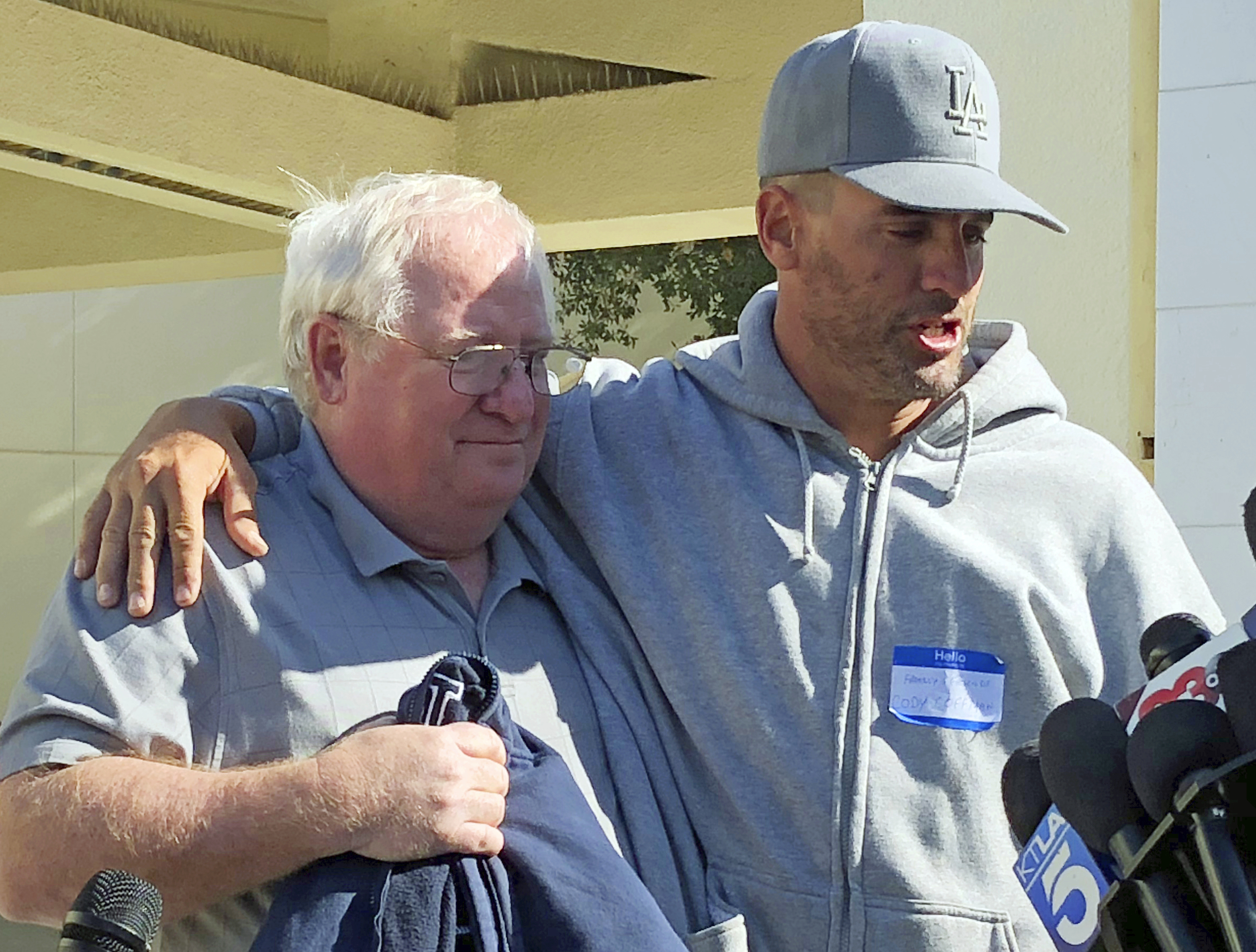 Jason Coffman (right) said he last spoke to his son Wednesday night before Cody headed to the bar where the gunman opened fire.
