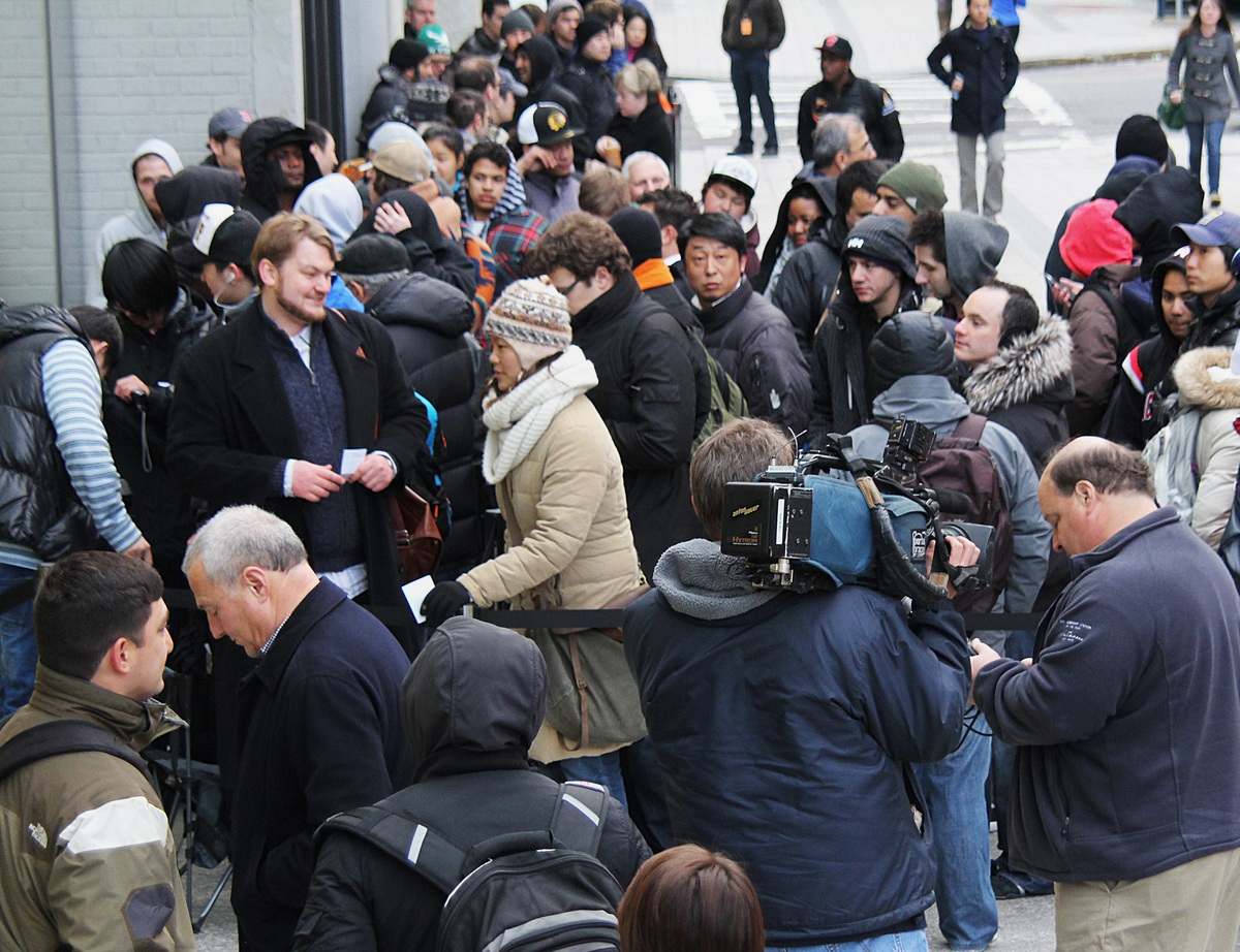 Over 200 people waited outside the Apple Store on Boylston Street before it opened at 8 a.m.
