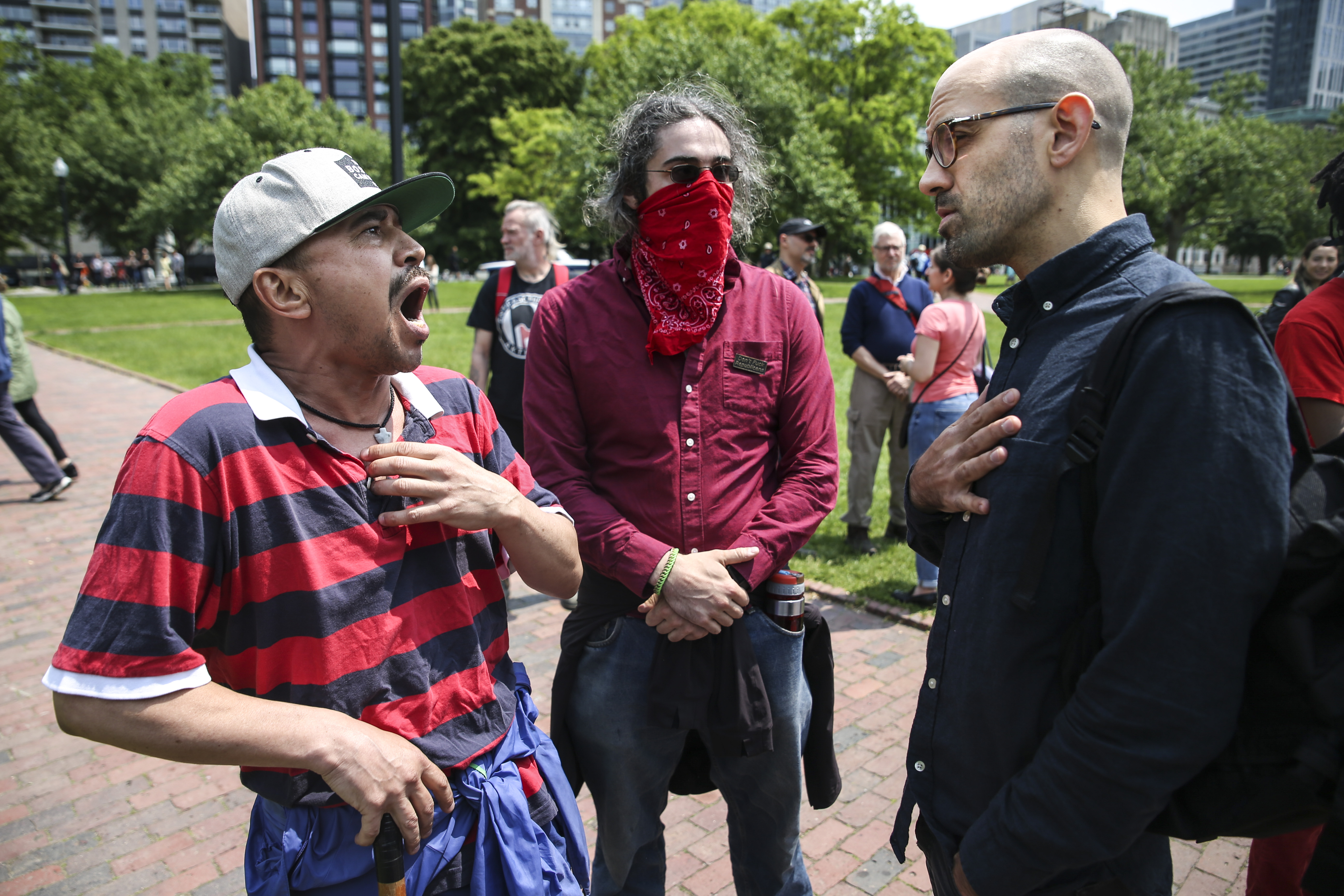 A protester (left) argued with an anti-abortion supporter (right).