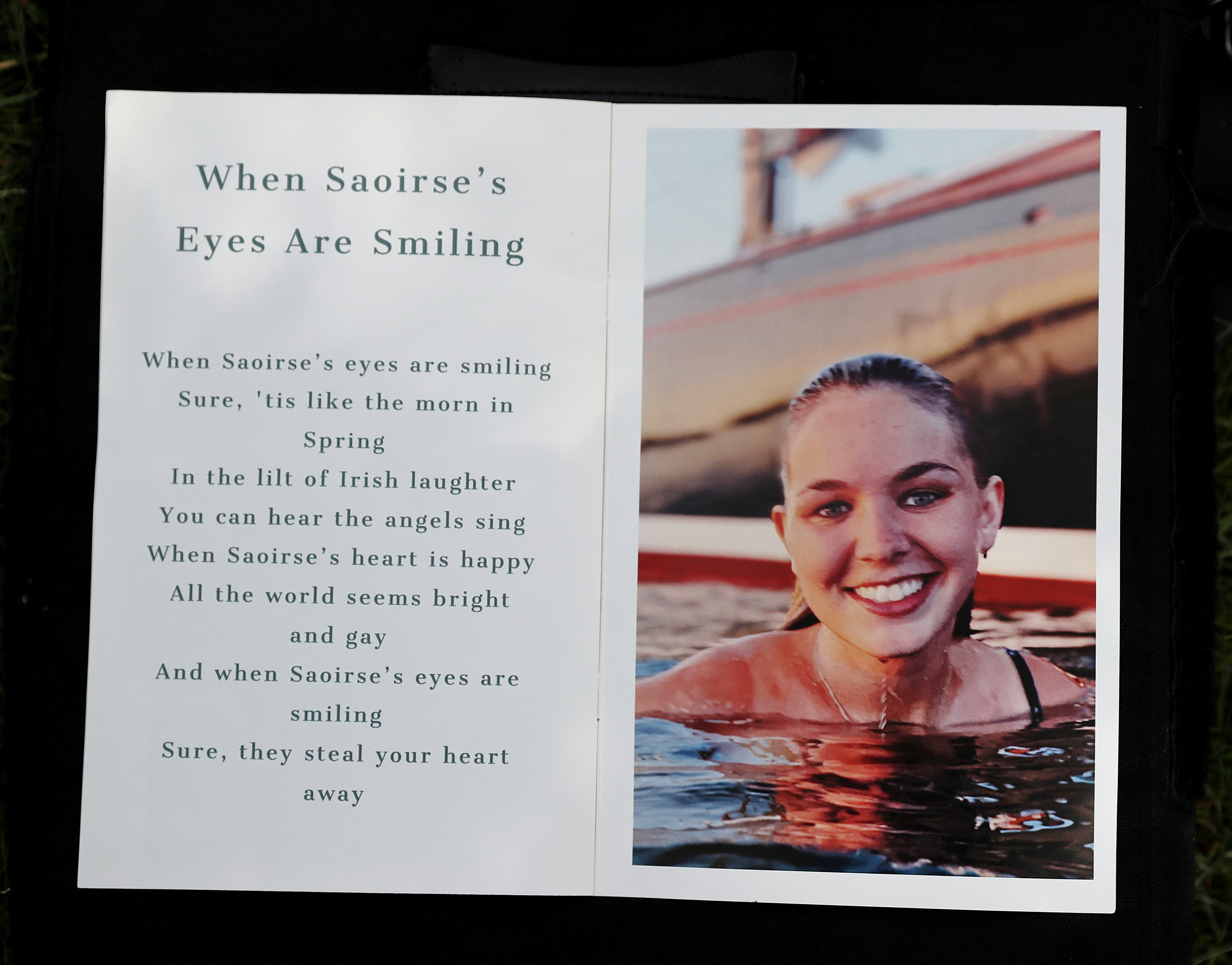 A photo of a poem for Saoirse Roisin Kennedy Hill at Our Lady of Victory Church in Centerville.