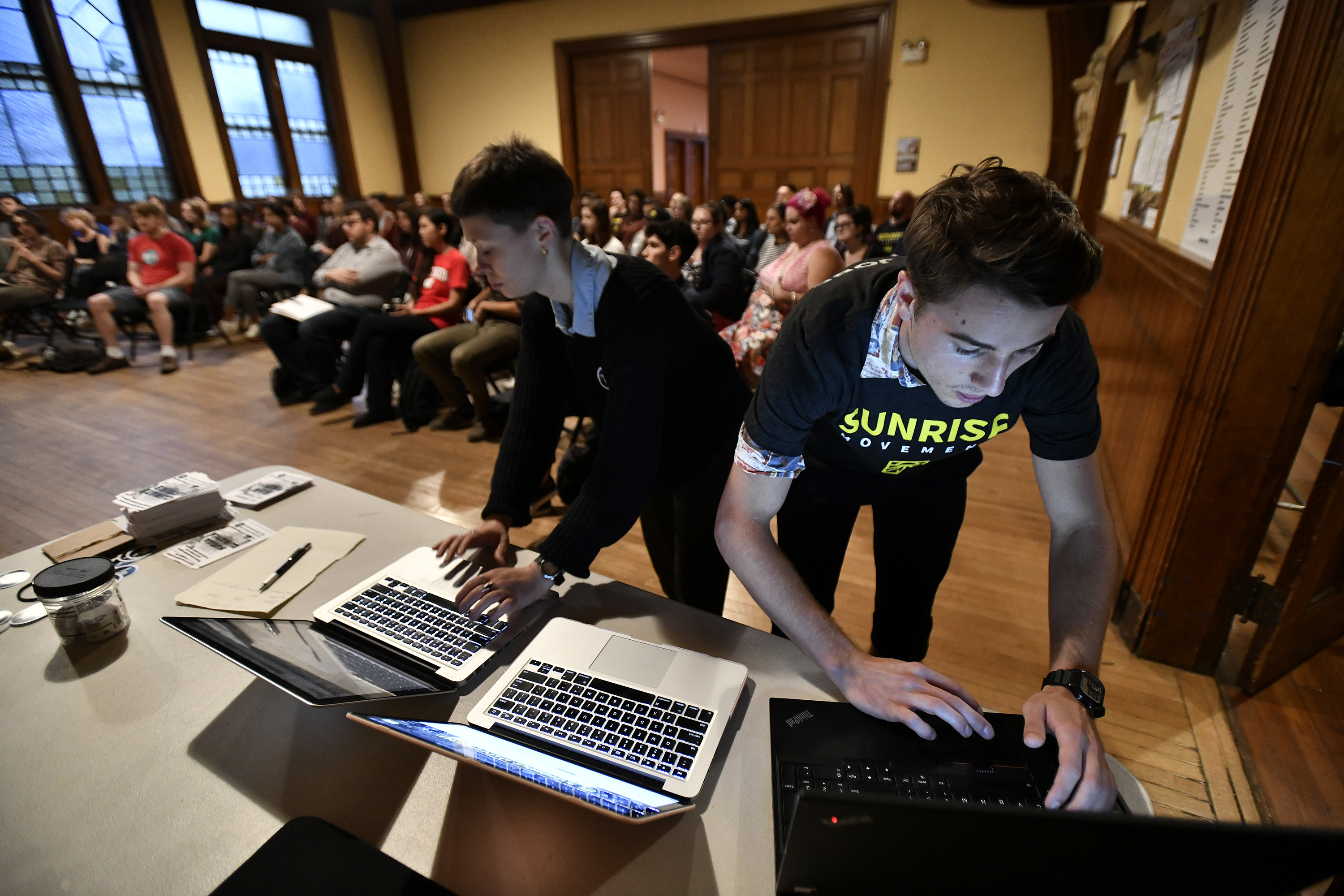Sarah Duckette and Owen Woodcock, both of Jamaica Plain, prepared for a meeting of Sunrise, an organization focused on youth climate activism.