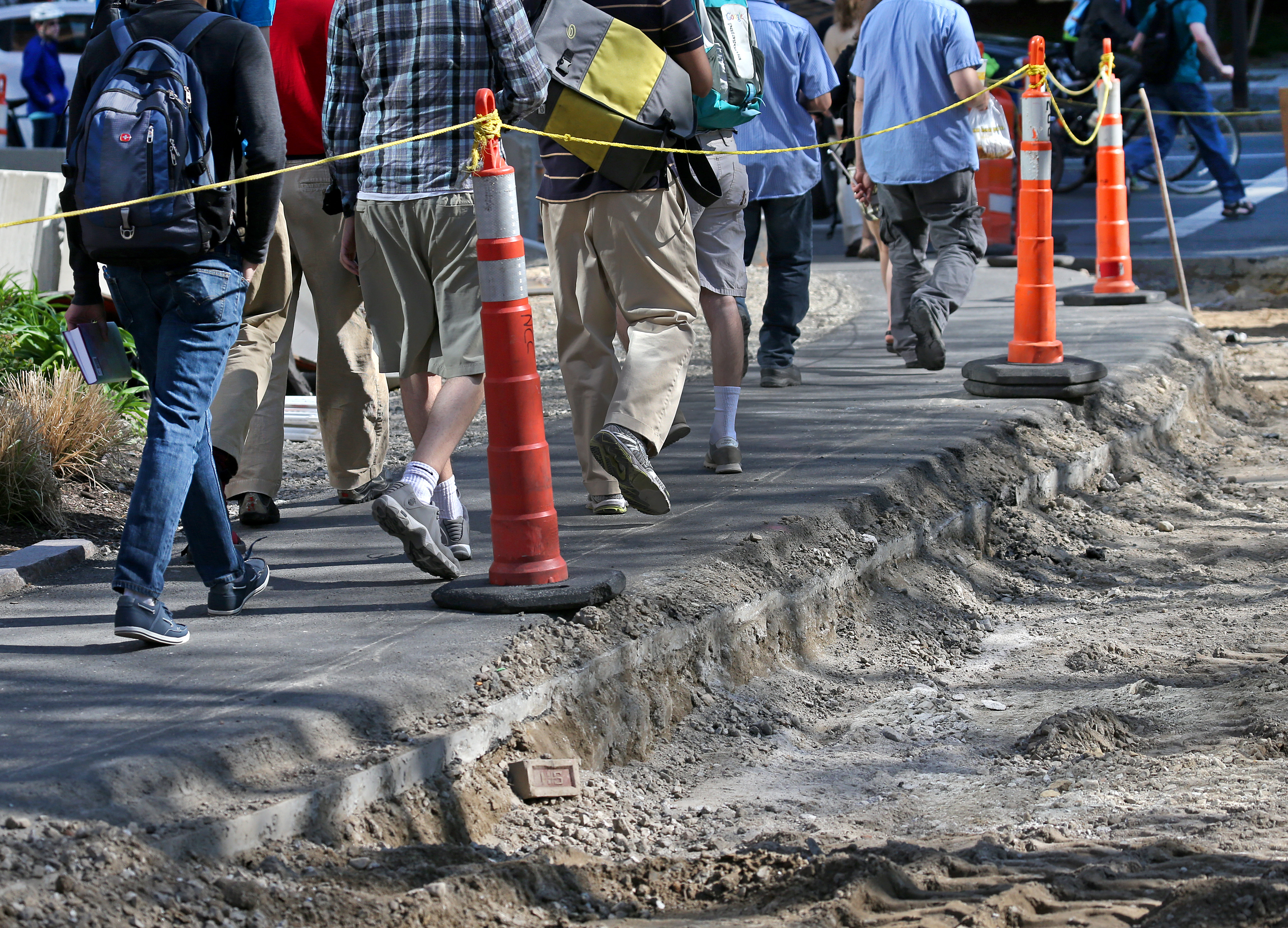 Pedestrians were herded through constuction lines in the Kendall Square area off Main Street.