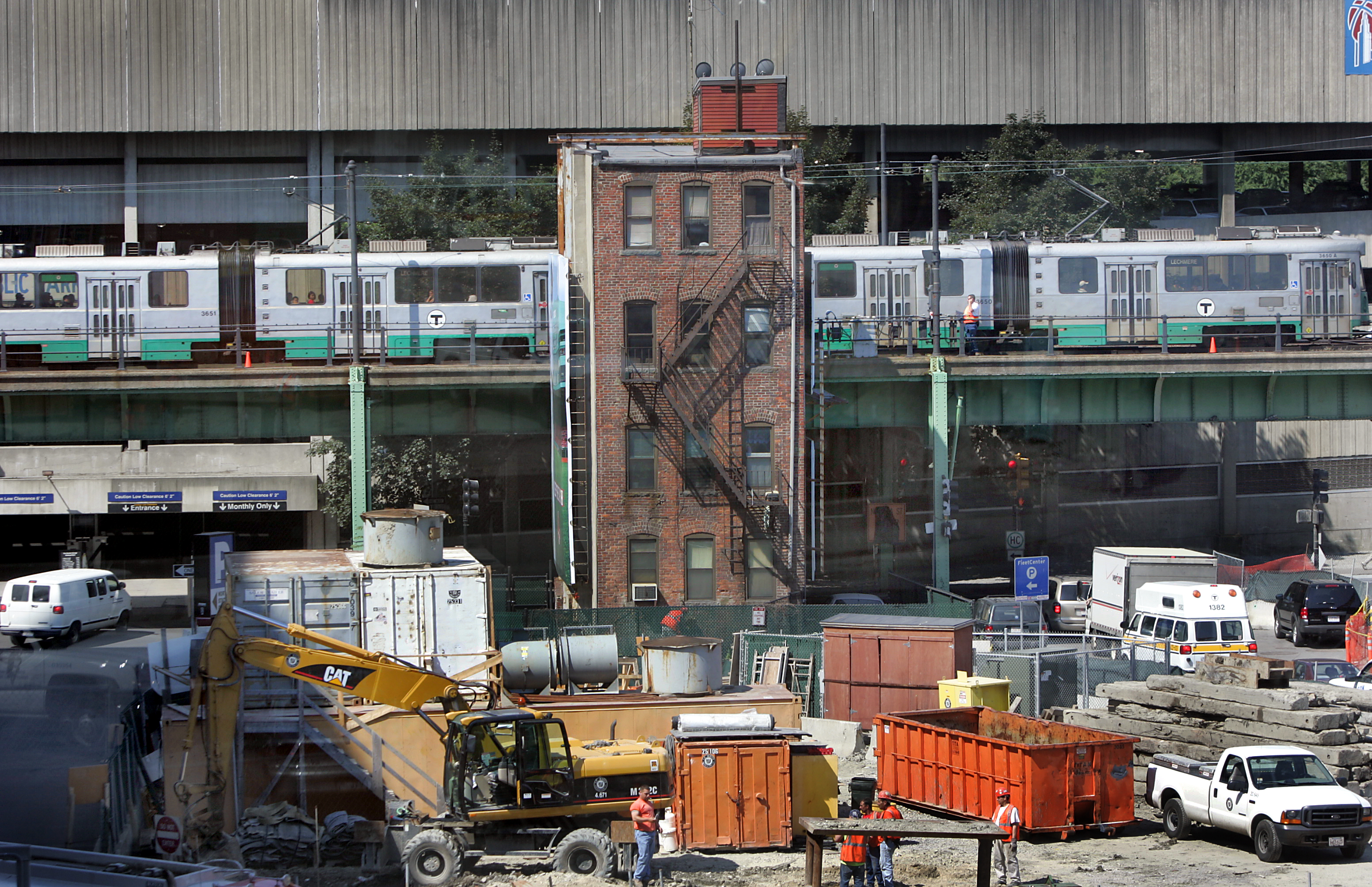 In June 2004, the last tenement in Boston was hemmed in by the MBTA’s Green Line on one side and a Big Dig staging area on the other.