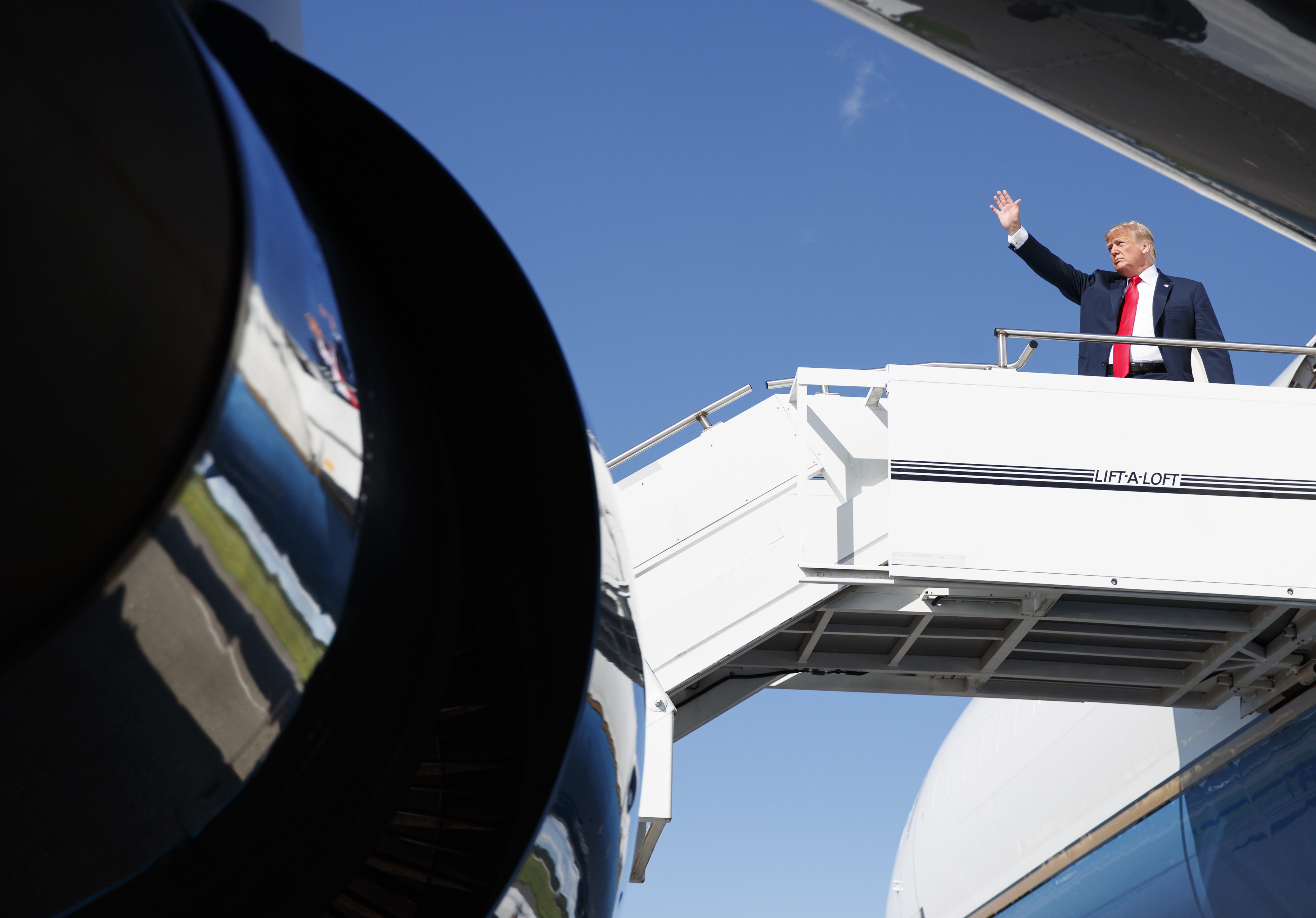 President Trump waved as he boarded Air Force One on Aug. 4.
