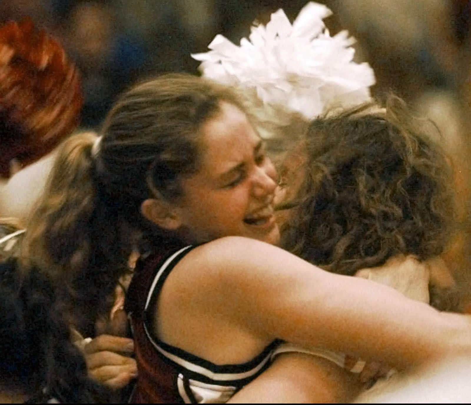 Harvard's Sarah Russell (left) hugged Laela Sturdy after Harvard beat Stanford 71-67 in the first round of the NCAA women's basketball tournemant in 1998.