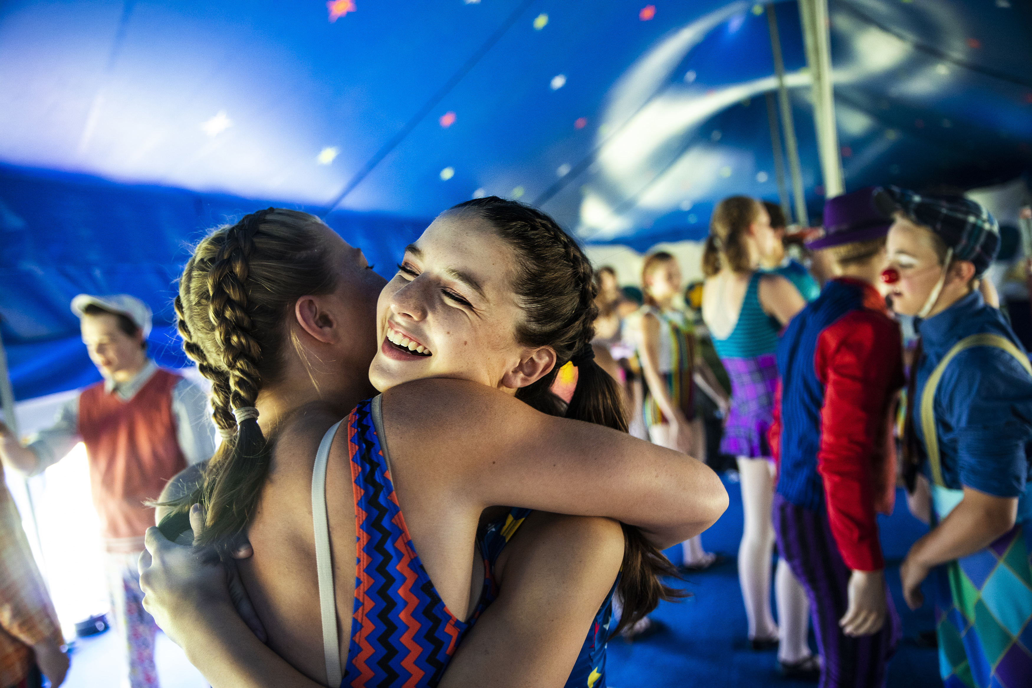 Troupers hugged before they perform in Circus Smirkus' Big Top Tour.