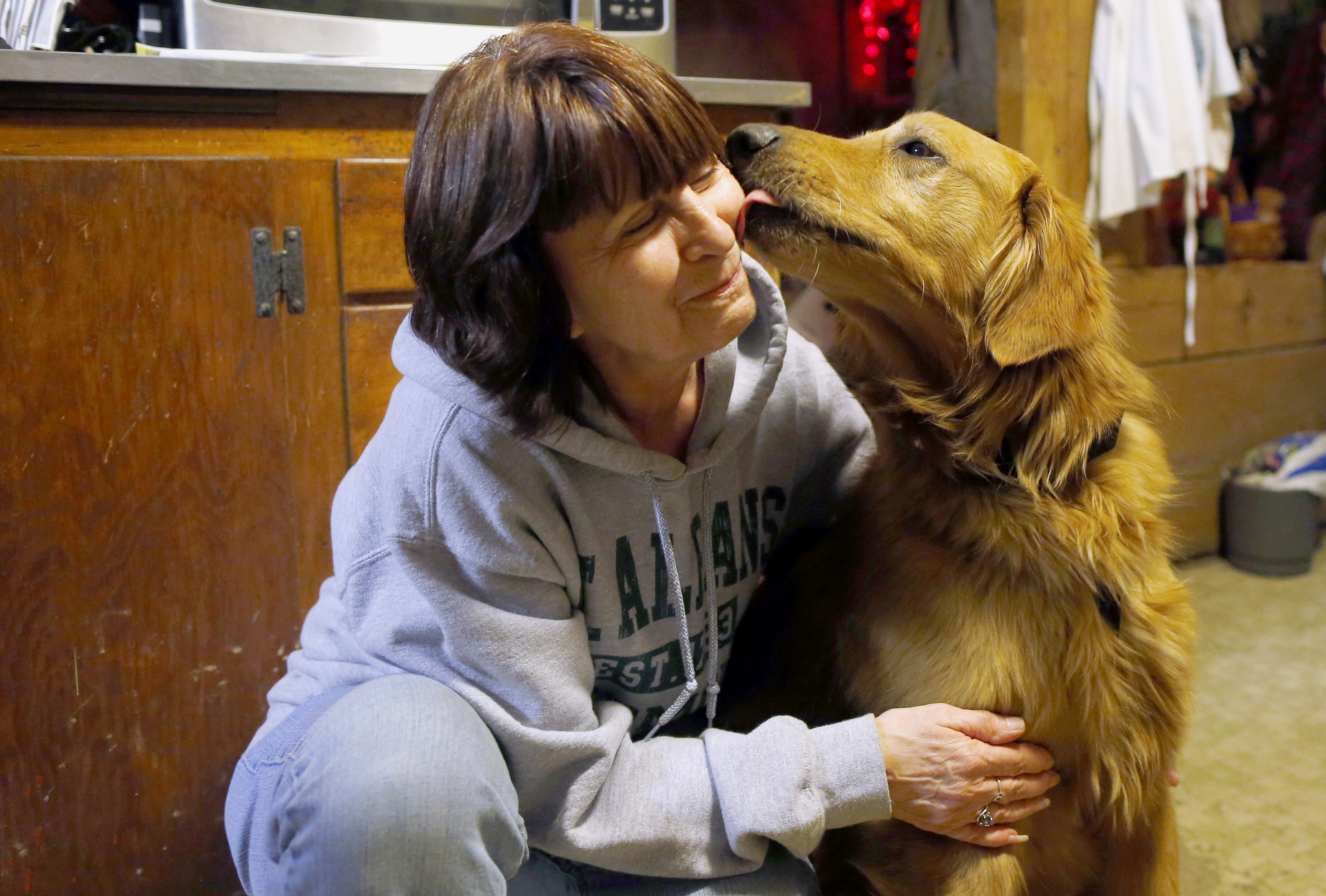 Pat Hamel got a kiss from Murphy inside her kitchen last week in Morrisville, Vt.