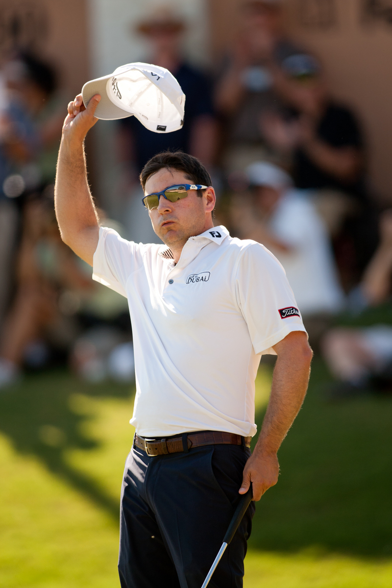 An emotional Ben Curtis, who has struggled just to get into tournaments, tips his cap after winning the Texas Open.