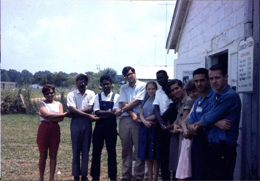 SNCC staff members joined hands.