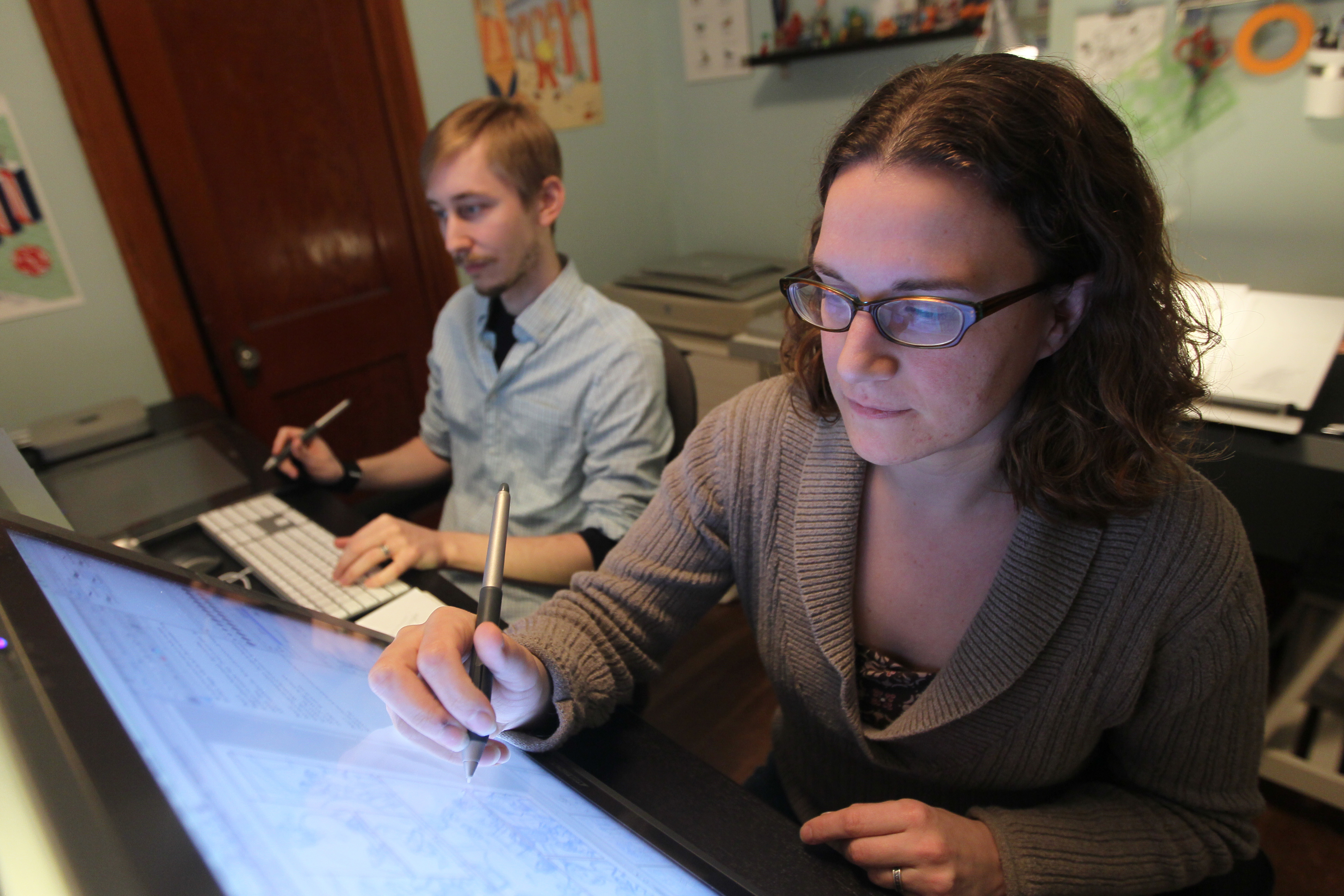 Braden Lamb and Shelli Paroline work in their watertown studio on Midas Flesh.